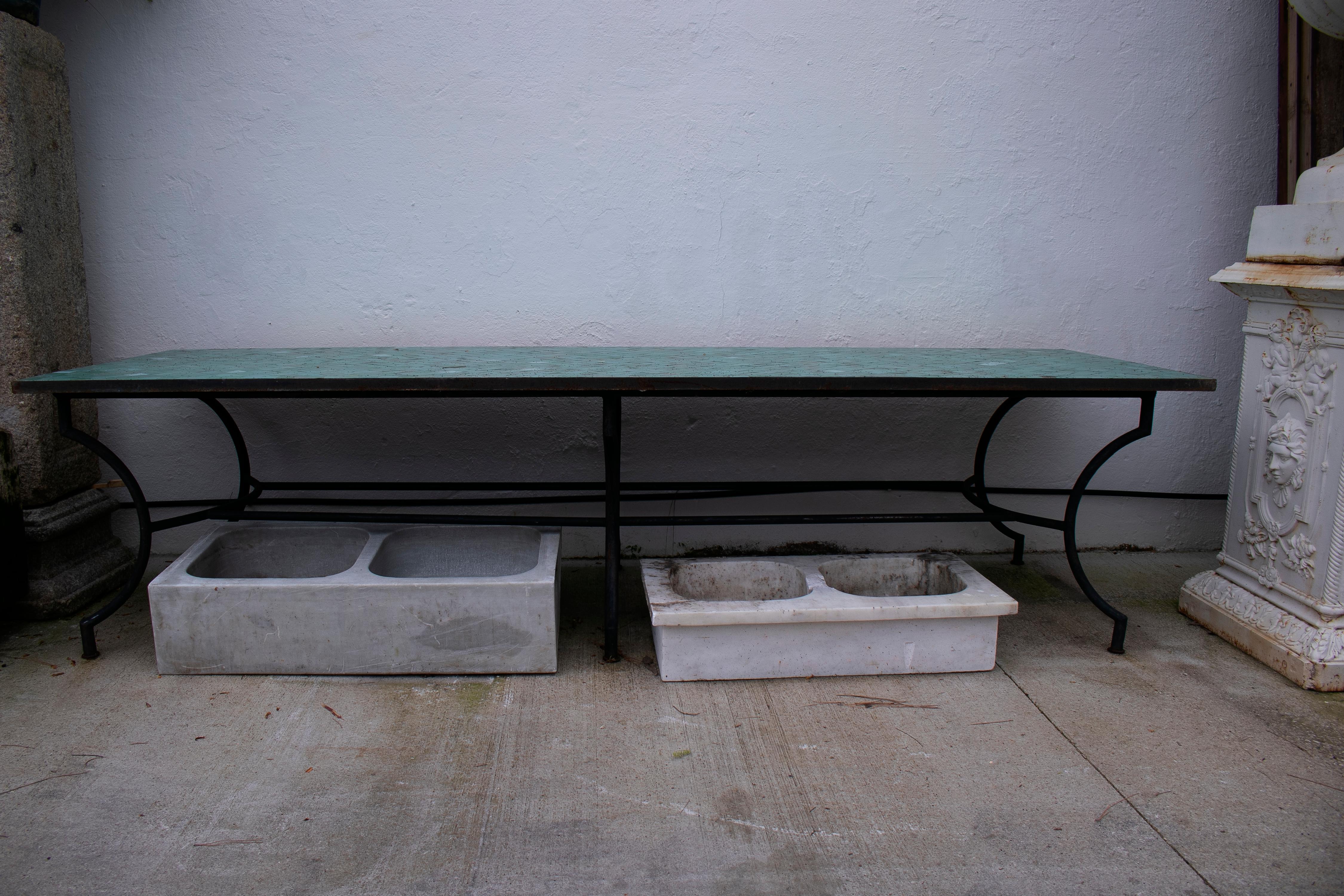 Rectangular Spanish handmade green glazed Zellige tiled iron outdoor garden table.