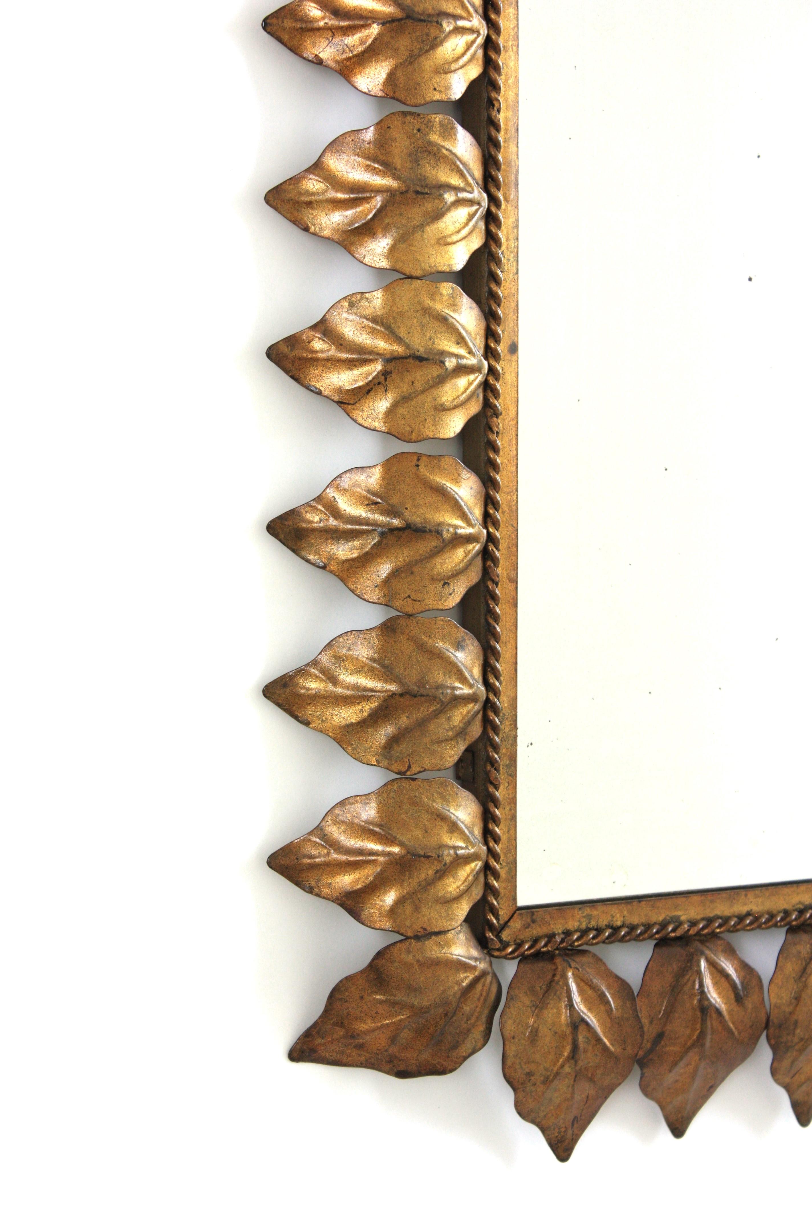Spanish Rectangular Sunburst Mirror in Gilt Iron with Leafed Frame, 1950s For Sale