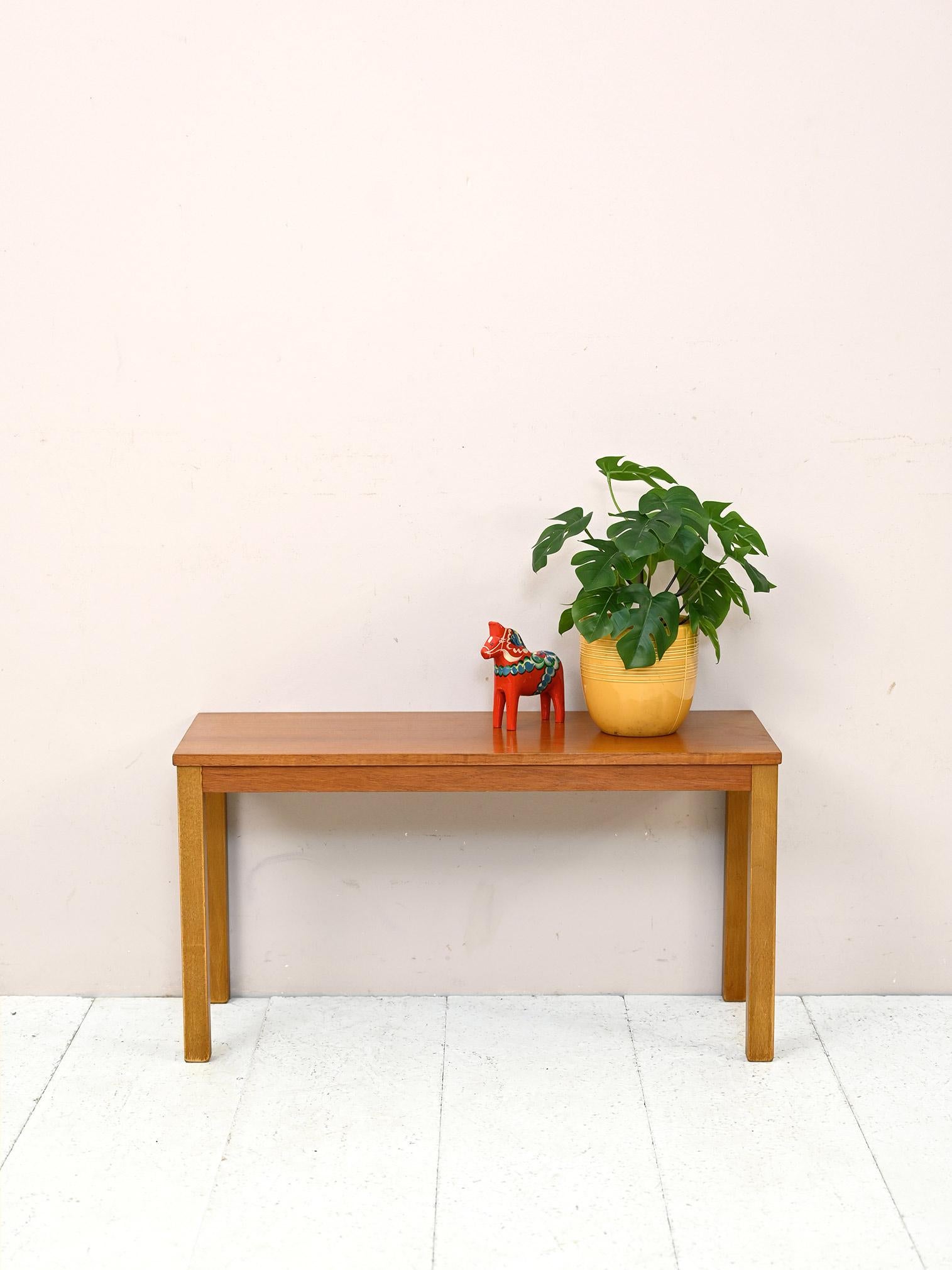 Original Scandinavian bench from the 1960s.

A piece of furniture with small dimensions and typical scandi style.
It can be used as a sofa table but also as a bench to embellish an entryway or bedroom.

Good vintage condition. A conservative