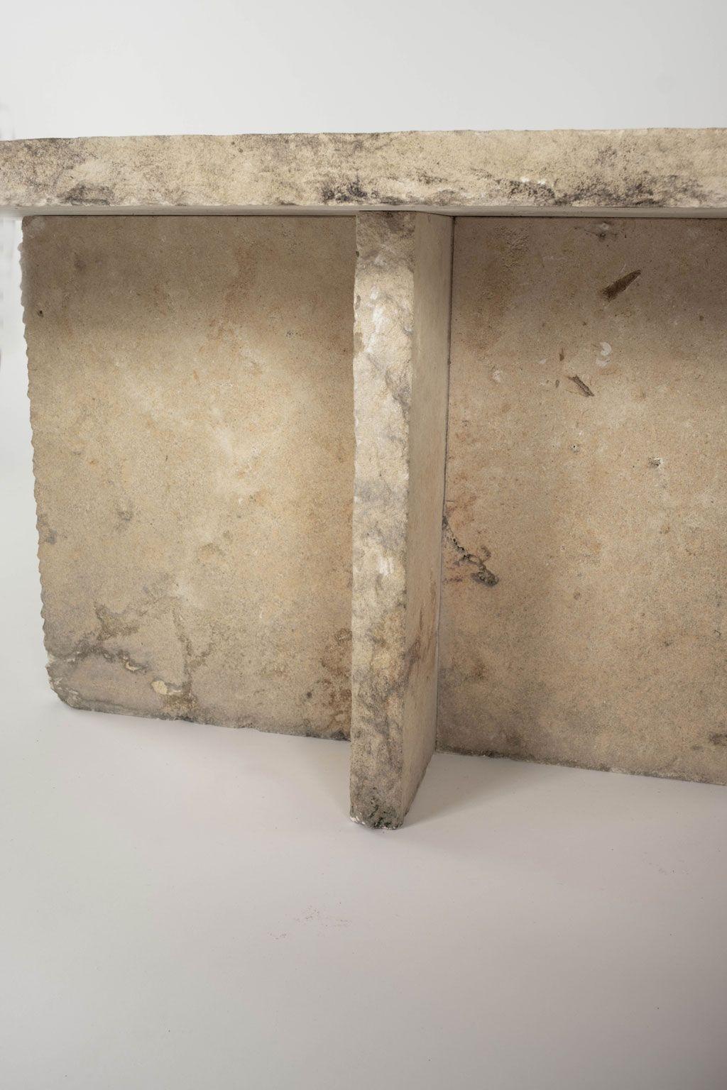 Rectangular top limestone coffee table. Hand cut rectangular limestone top raised upon two piece limestone base.