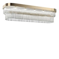 Lámpara de araña rectangular de cristal transparente con acabado dorado y estructura metálica, de 22 luces