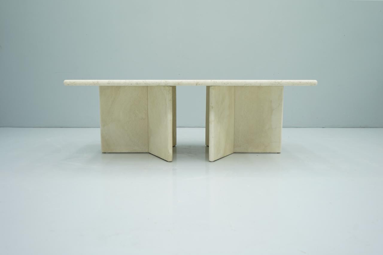 Rectangular travertine coffee table, with two triangular frames, Italy, 1970s. 

Very good condition.
 