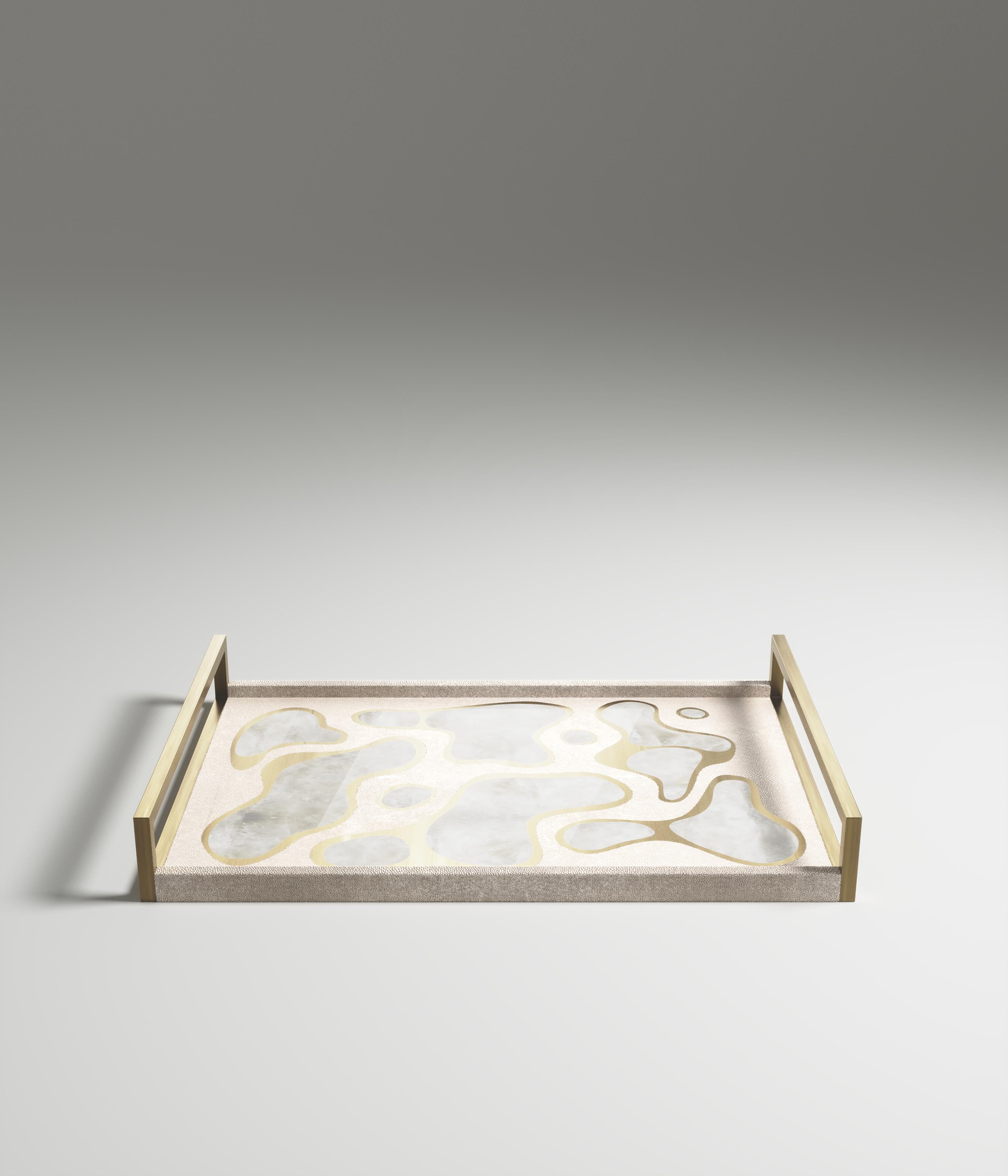 The Mask Rectangular Tray by Kifu Paris is a versatile and organic piece. The amorphous top is inlaid in a mixture of cream shagreen, white quartz and bronze-patina brass. This piece is designed by Kifu Augousti the daughter of Ria and Yiouri