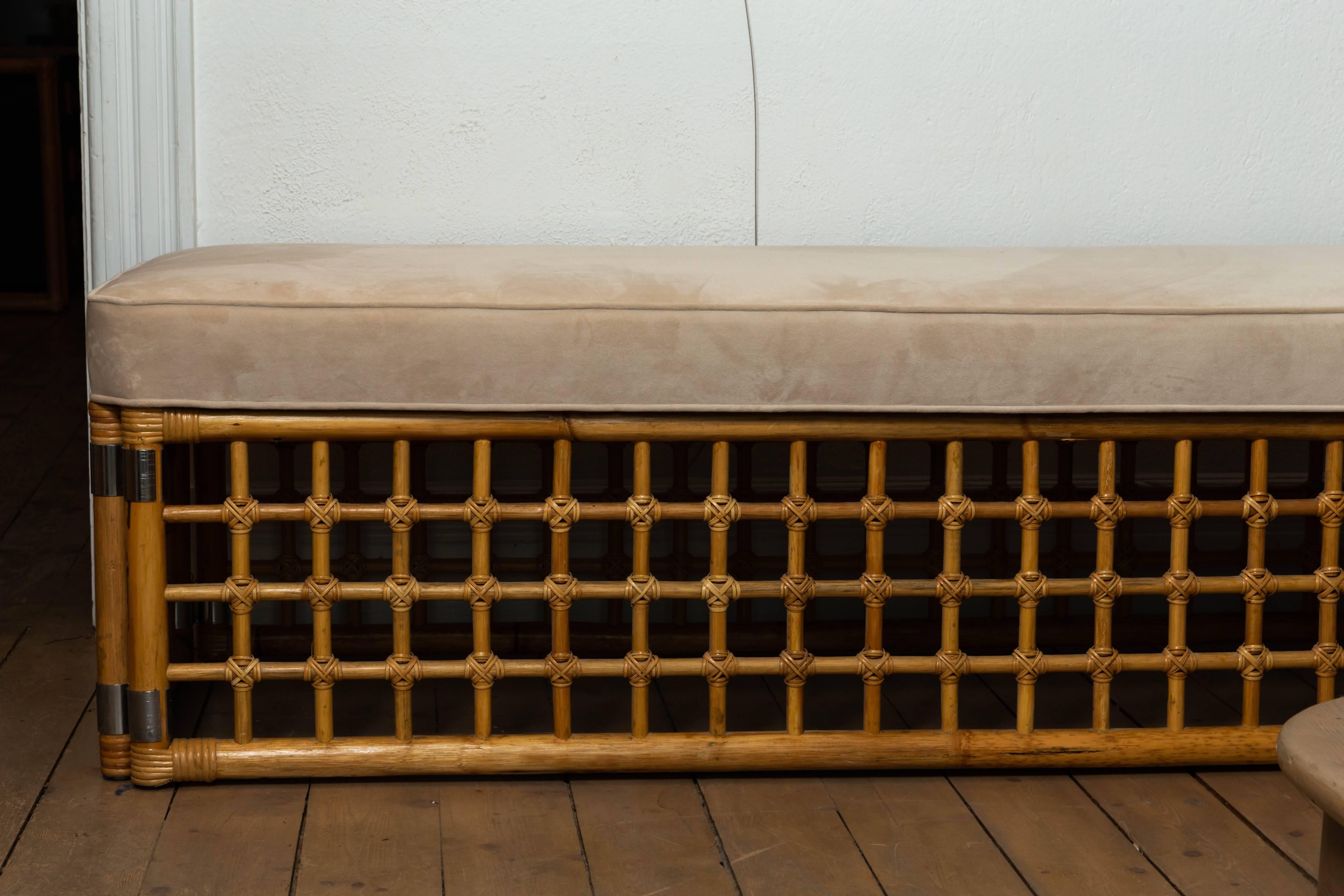 Rectangular upholstered bench with bamboo lattice design.