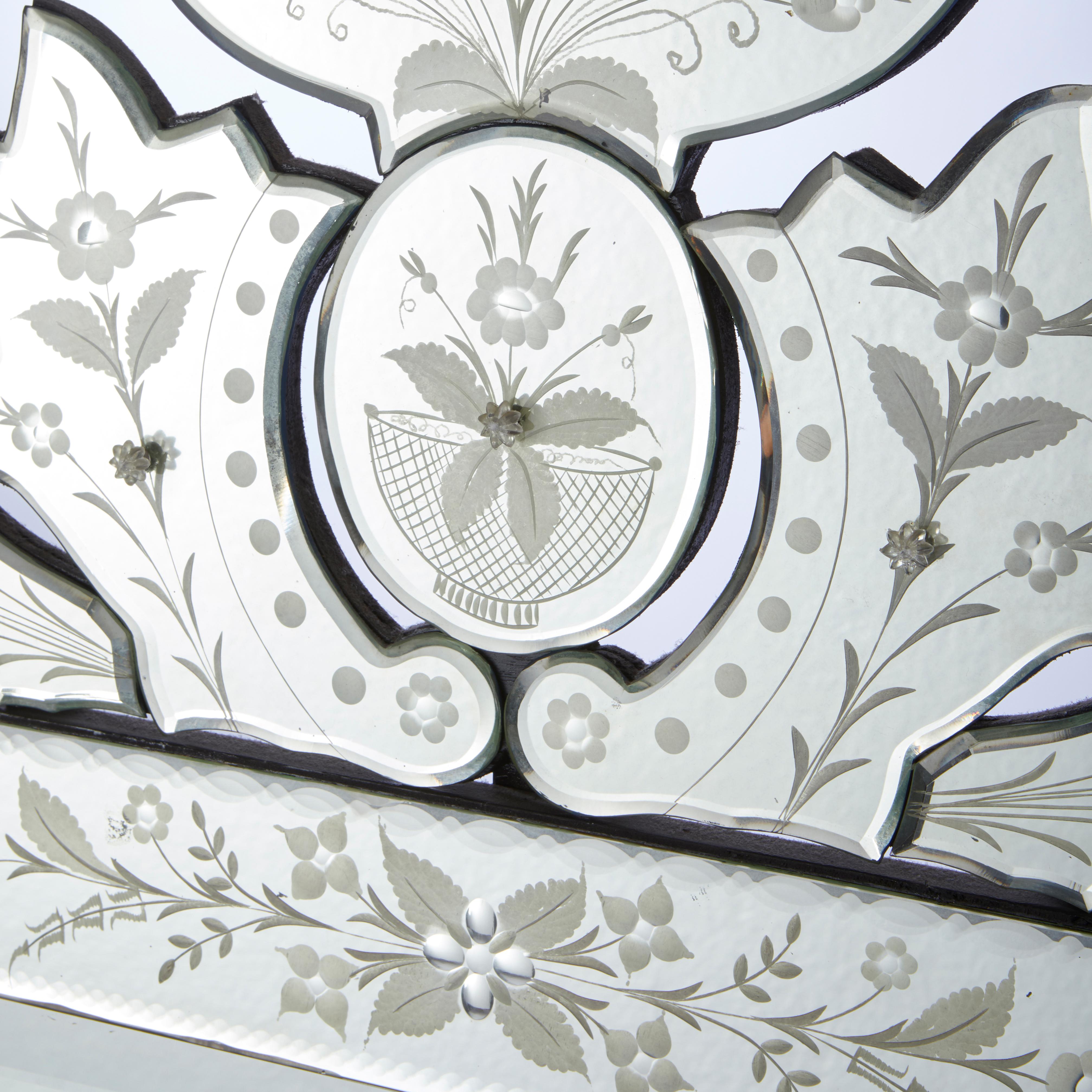 Rectangular Venetian mirror, center glass is framed with etched glass covered frame and etched designs. 