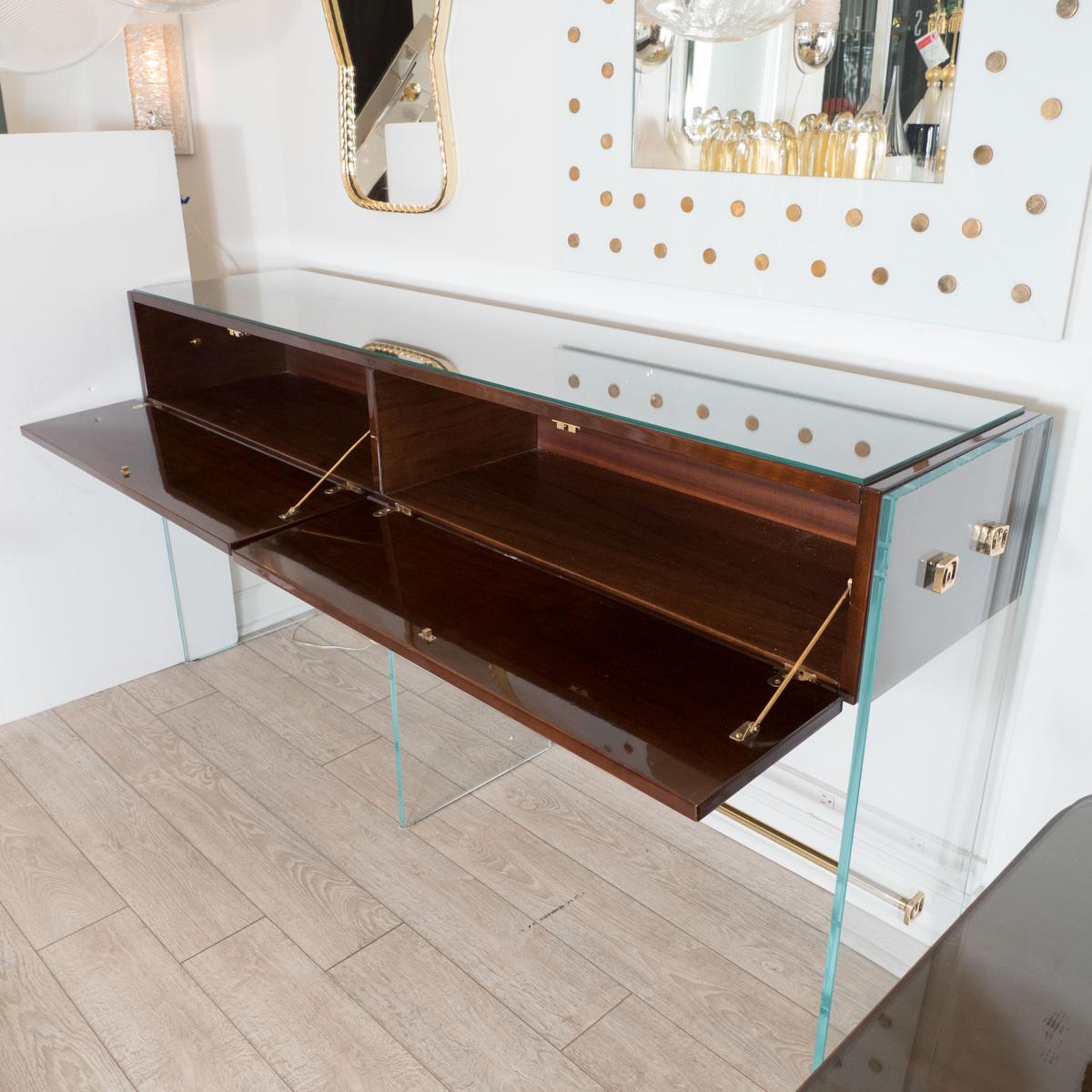 Rectangular walnut console with two drop down drawers and glass surround by Frigerio.