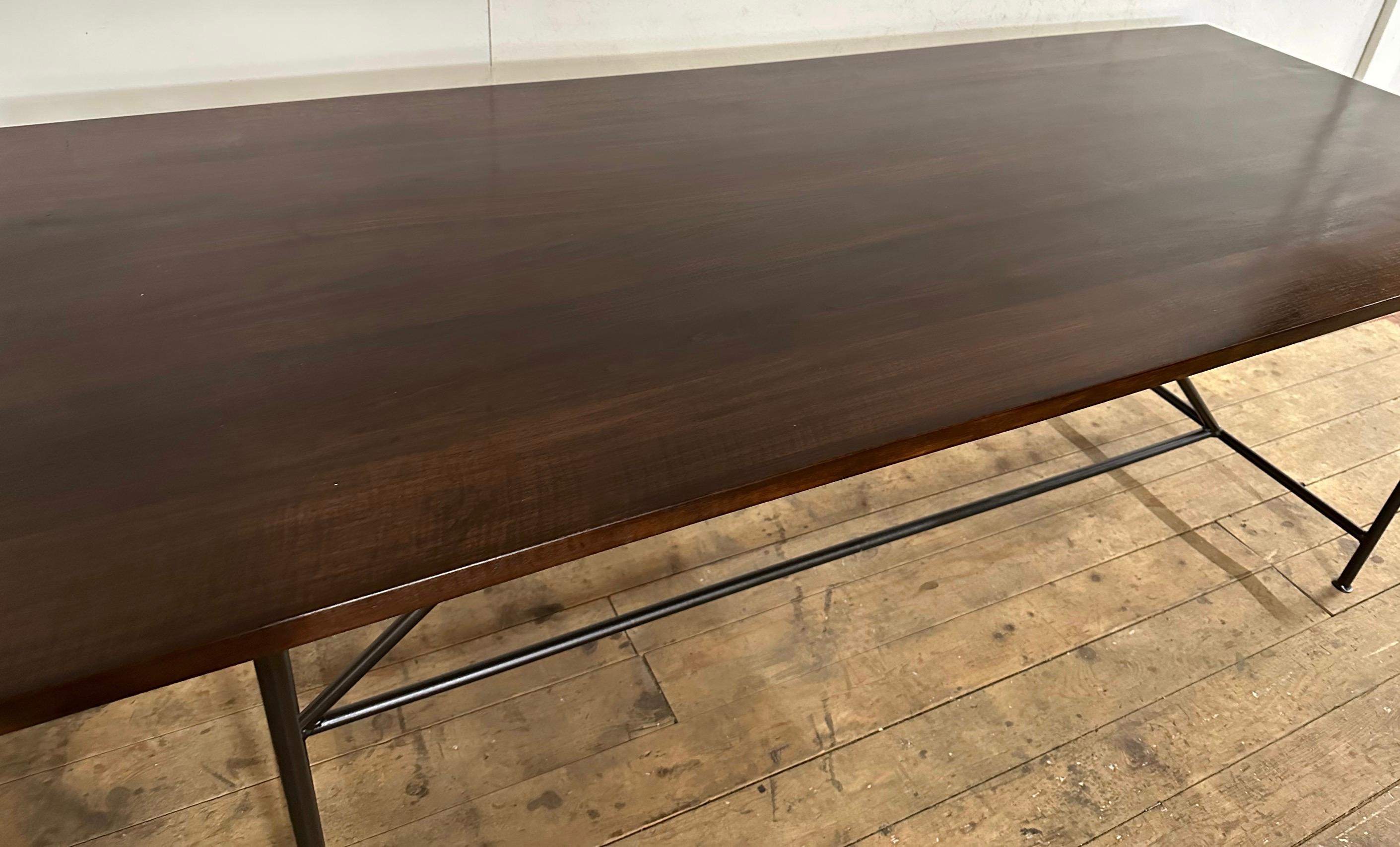 Elegant and rustic at the same time, this wrought iron dining table base with walnut top can be used a dining table, a desk, or a conference room table.
Search terms: Classical, neoclassical style, Industrial style, Minimalist
desk, conference