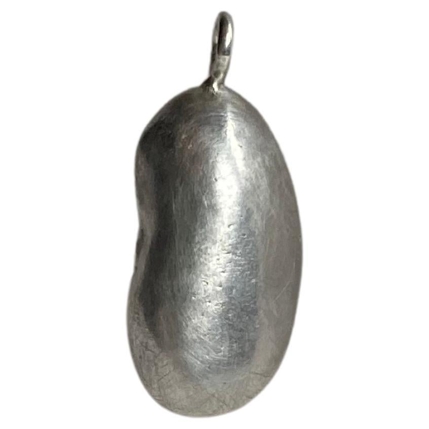 Recycled sterling silver kidney bean pendant For Sale