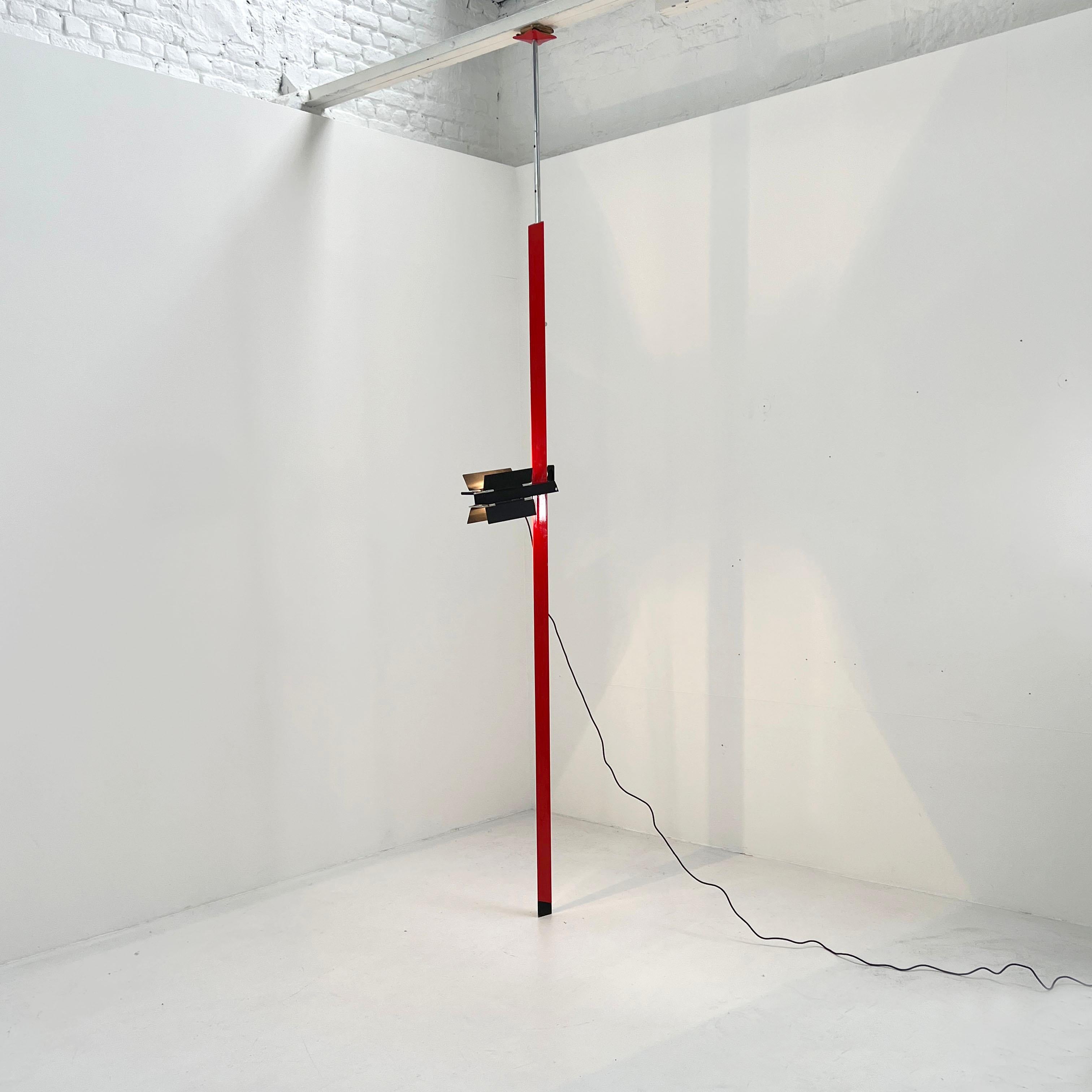 Producer - Lumenform
Design Period - Eighties
Measurements - Width 40 cm x Depth 9 cm x Height Min 255 cm / Height Max 393 cm. 
Materials - Metal
Color - Red, Black 
Light wear consistent with age and use. Some scuffs on the metal.