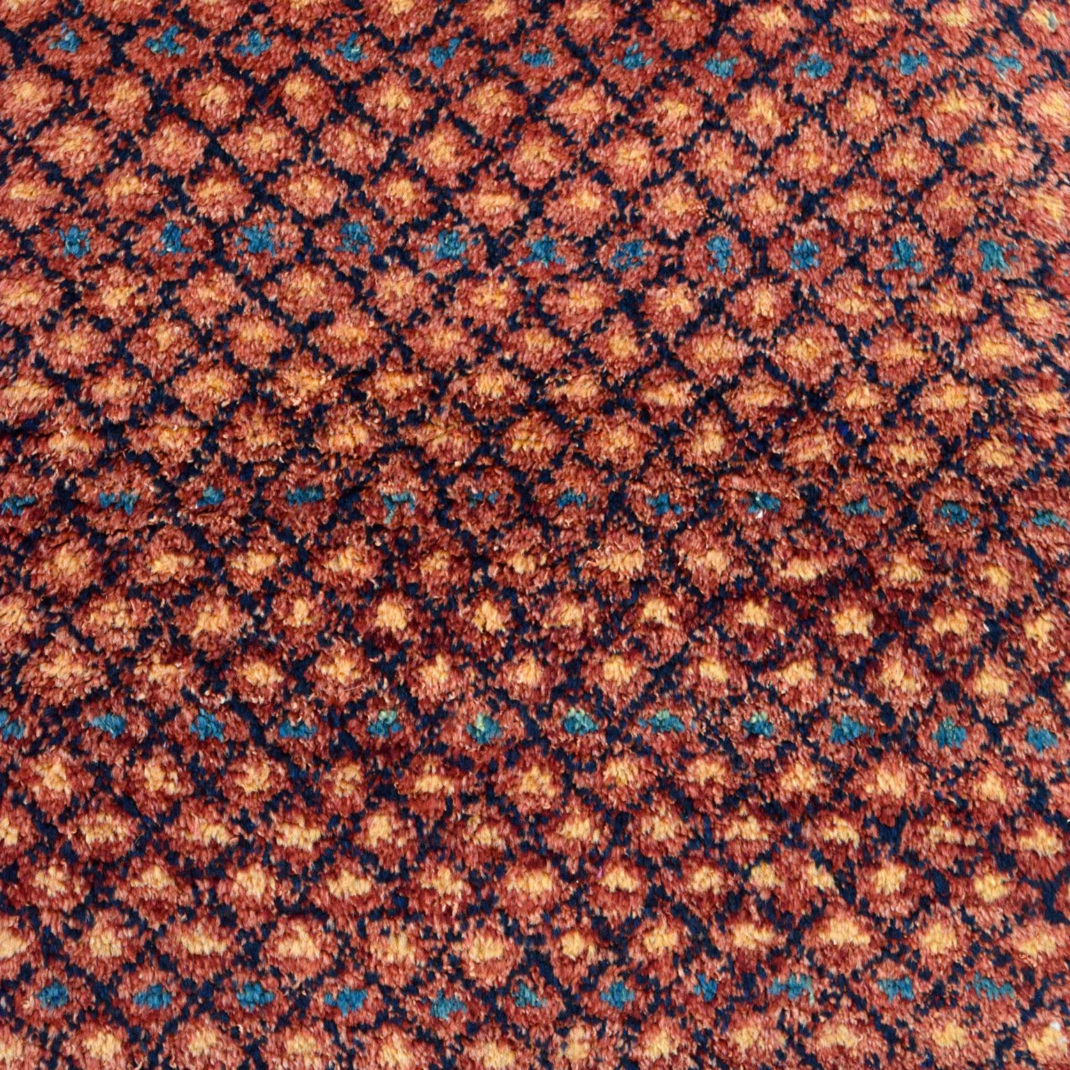 This Persian Gabbeh tribal rug measures 2'6