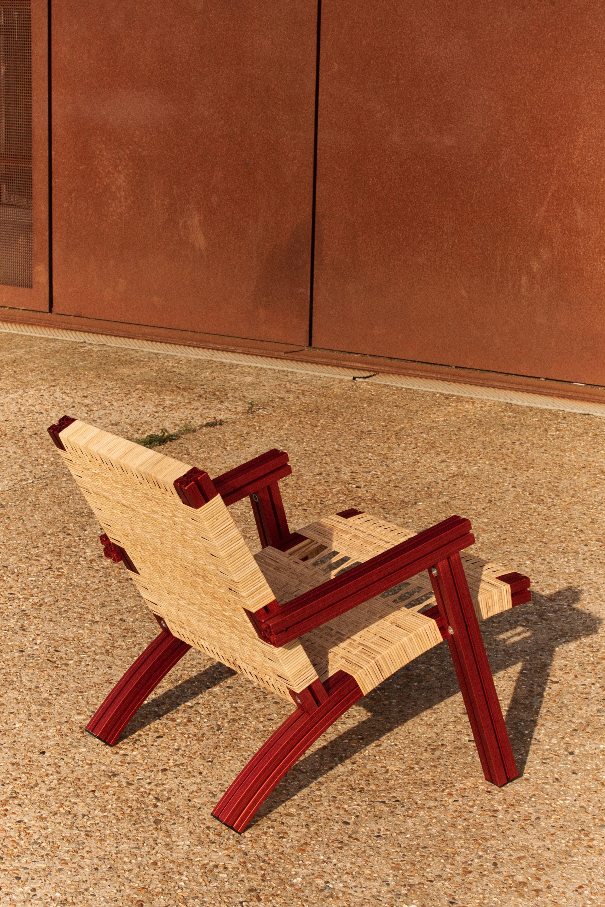 Modern Red Aluminium Armchair with Lapping Cane Seating from Anodised Wicker Collection For Sale