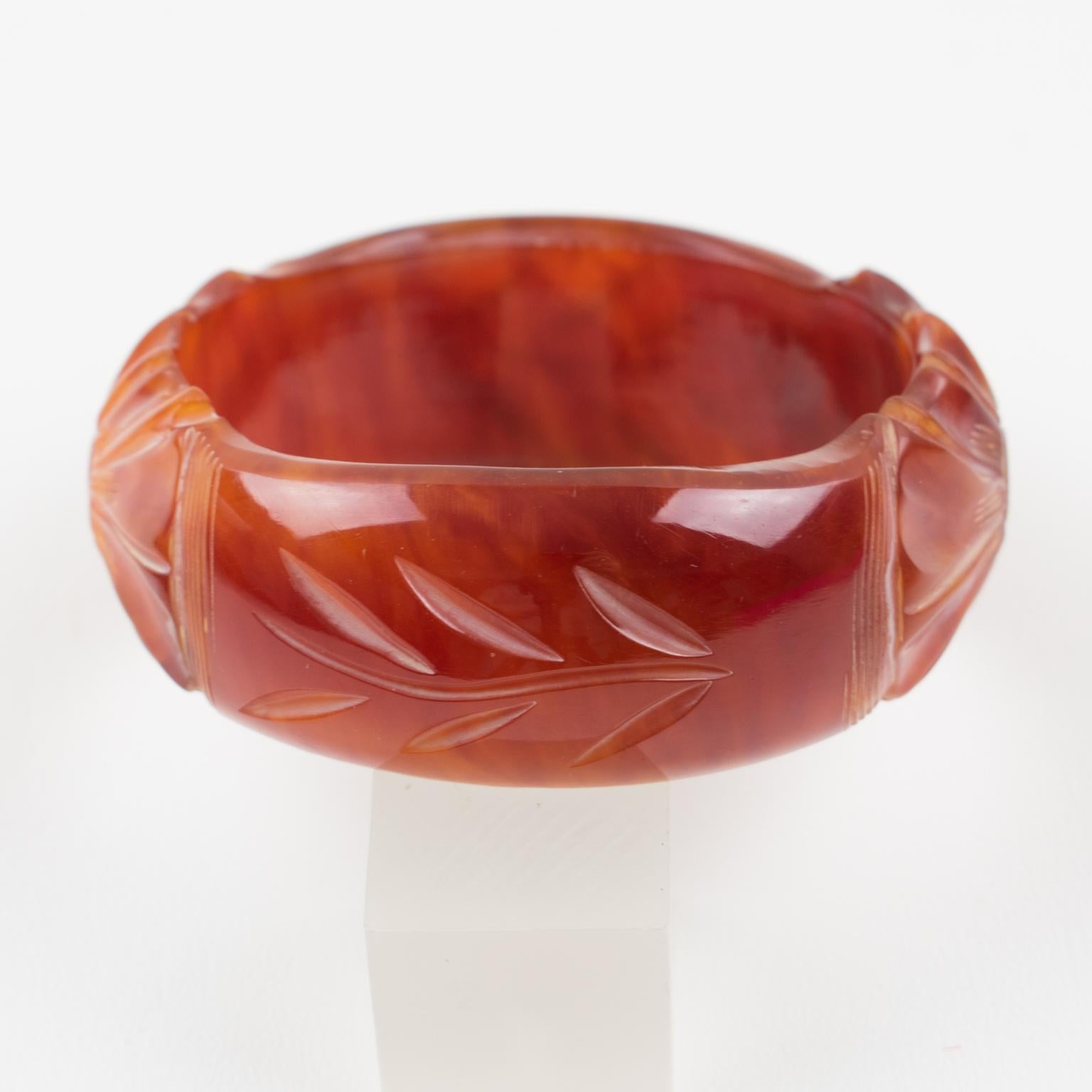 Amber Bakelite Bangle Bracelet with Floral carving In Excellent Condition For Sale In Atlanta, GA