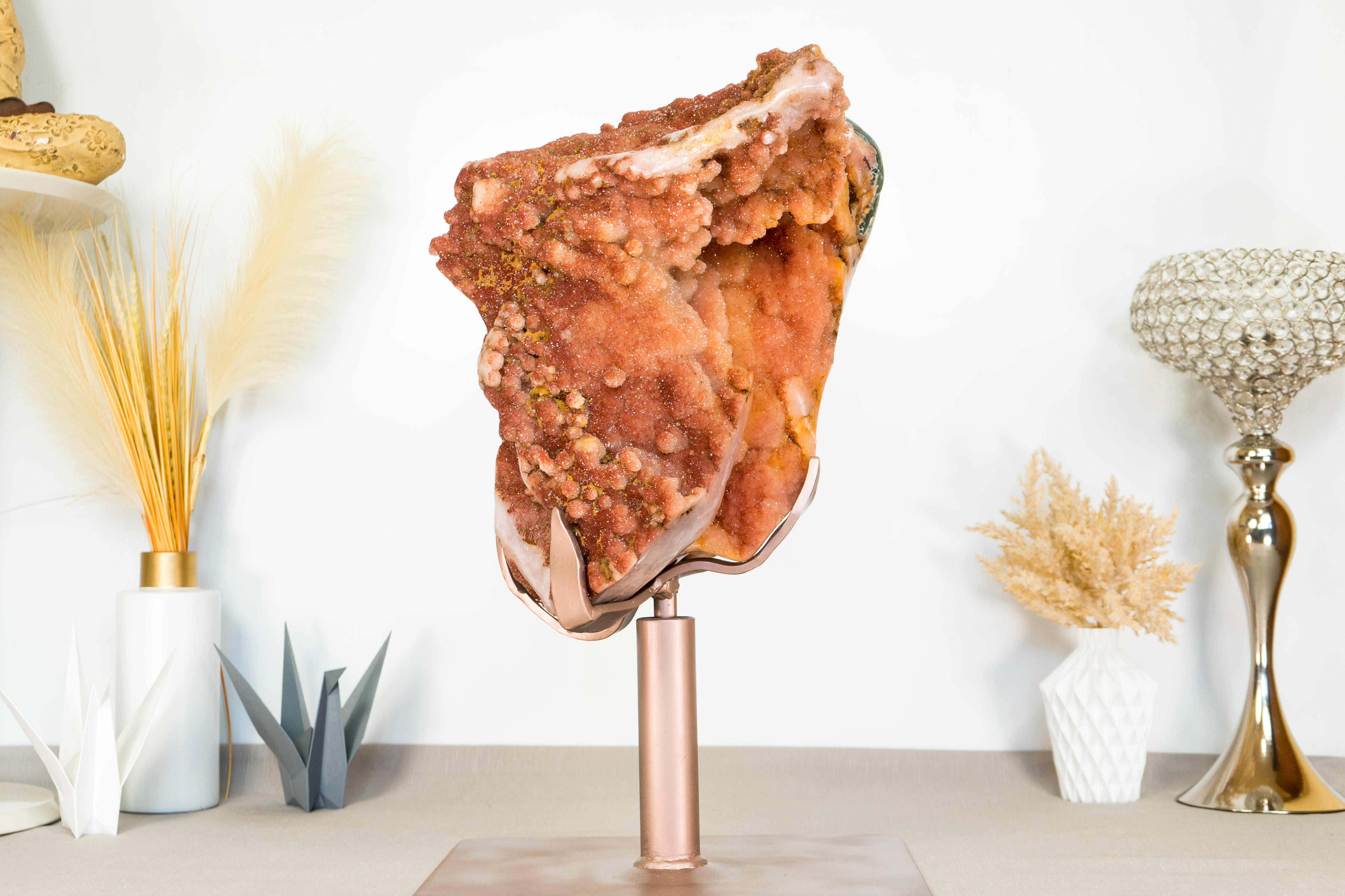 Truly stunning and unique, this Red Amethyst Geode is a natural marvel, it brings a vibrant hue of red that covers the entire geode and creates a mesmerizing display piece as it combines sparkling sugar-coated druzy, green jasper and fabulous
