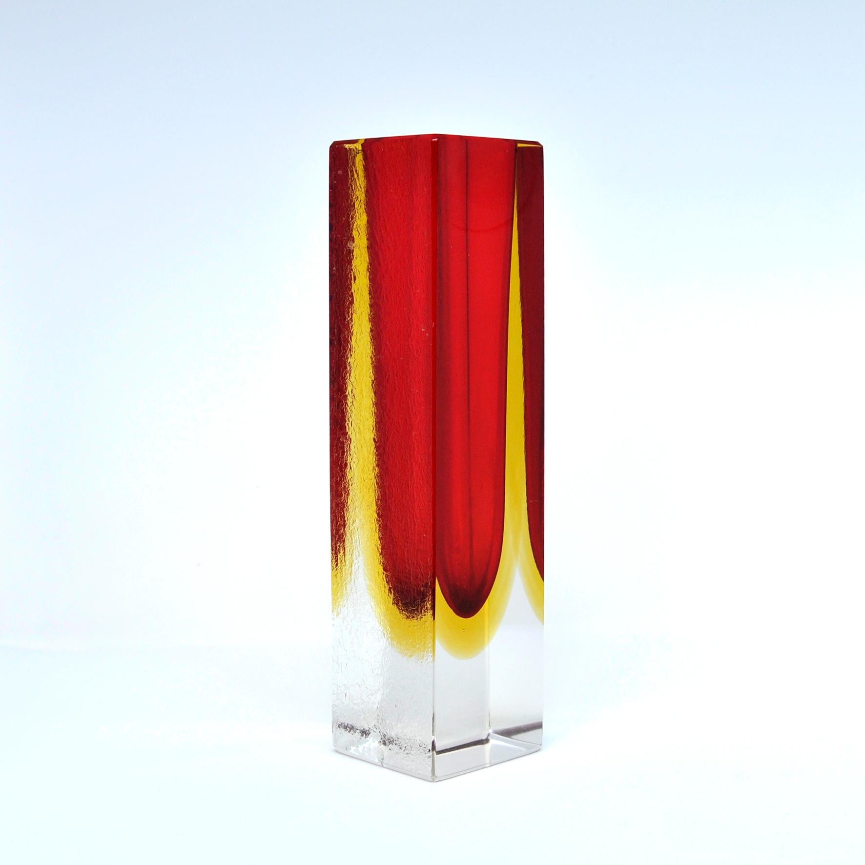 A gorgeous Murano square vase form in the sommerso technique utilizing layers of red and amber. Possibly by Mandruzzato. Italian, circa 1950.