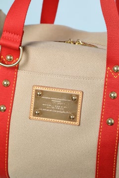 Red and beige canevas week-end bag Louis Vuitton Inventeur