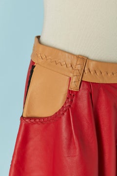 Red and beige leather short with braid on the edge TSUMORI CHISATO