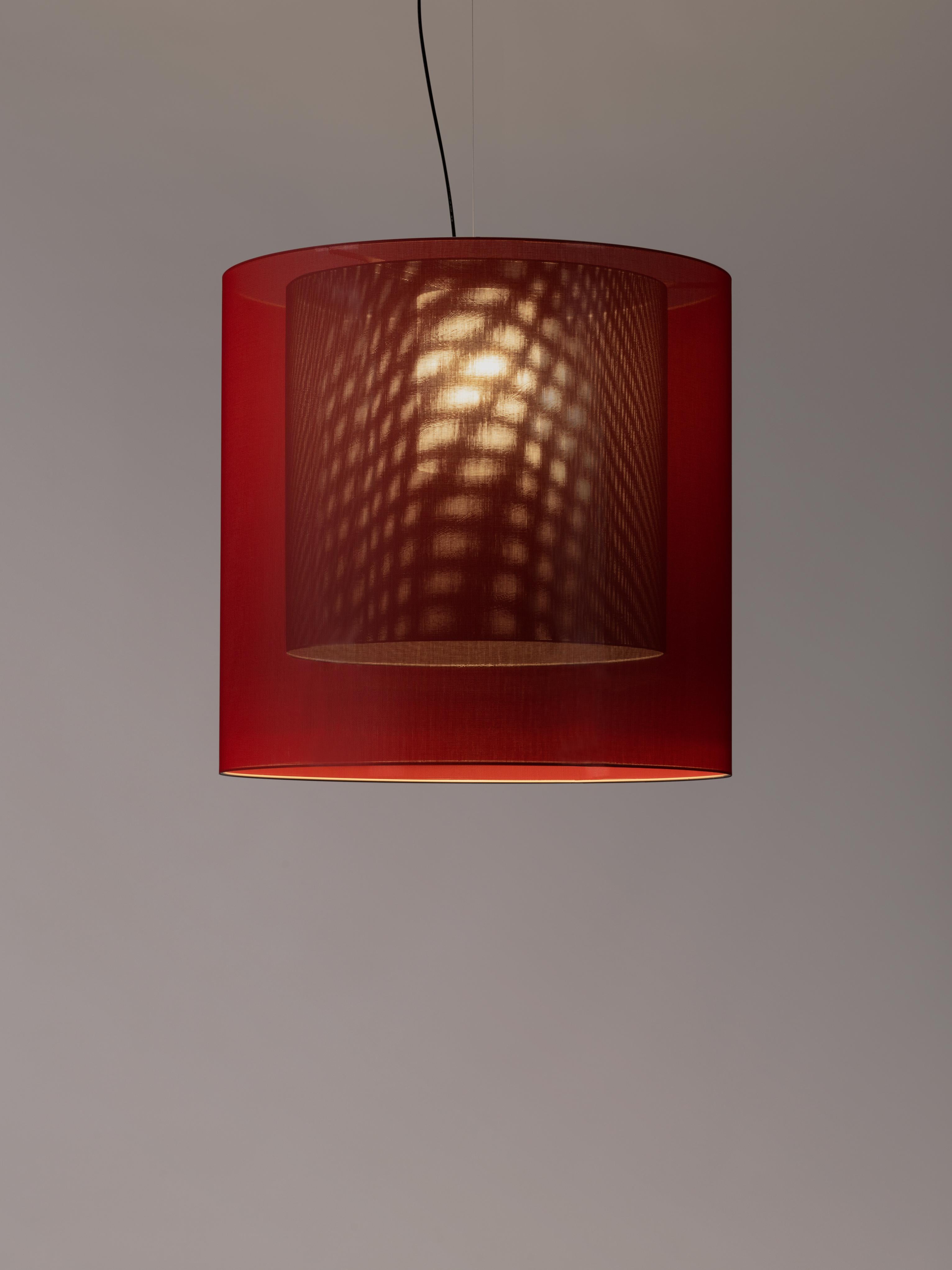 Red and black moaré XL pendant lamp by Antoni Arola
Dimensions: D 83 x H 81 cm
Materials: Metal, polyester.
Available in other colors and sizes.

Moaré’s multiple combinations of formats and colours make it highly versatile. The series takes