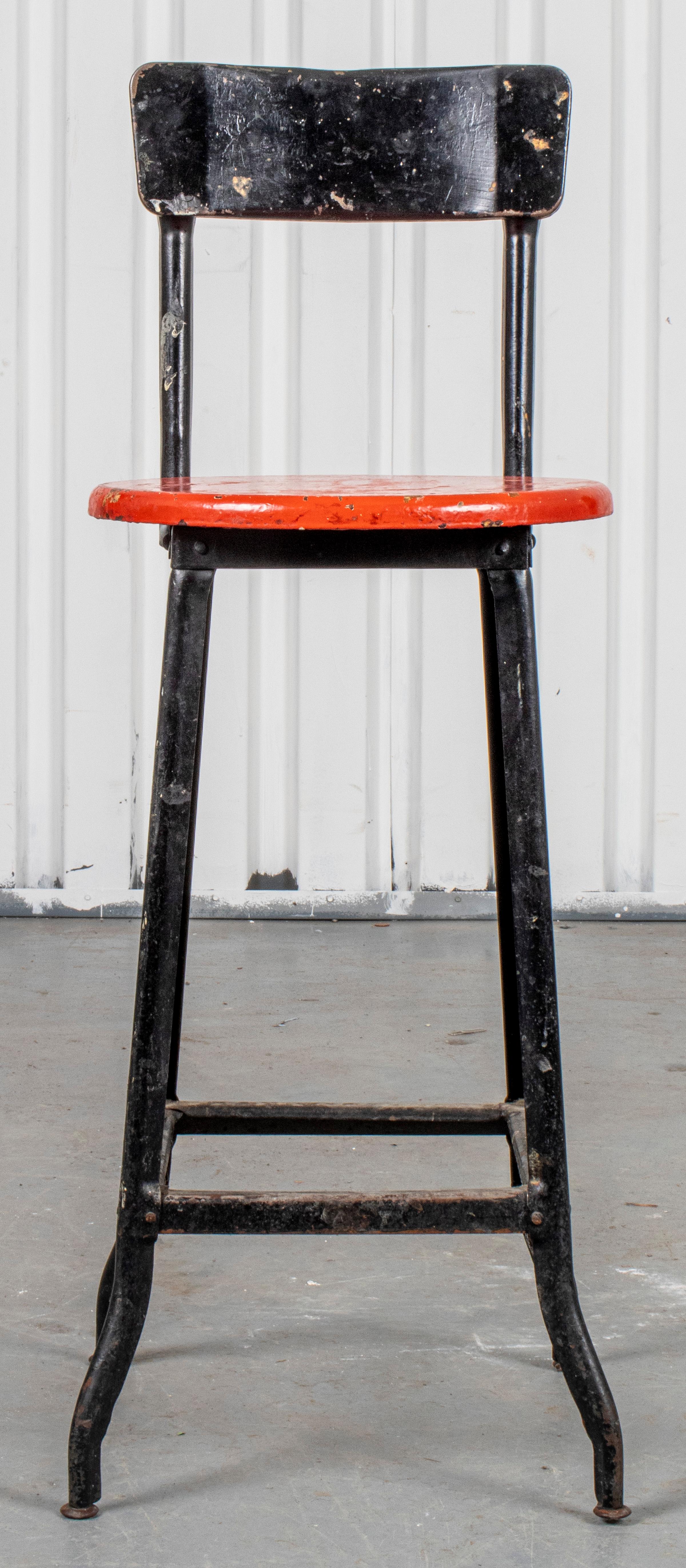 Red and black tall stool.