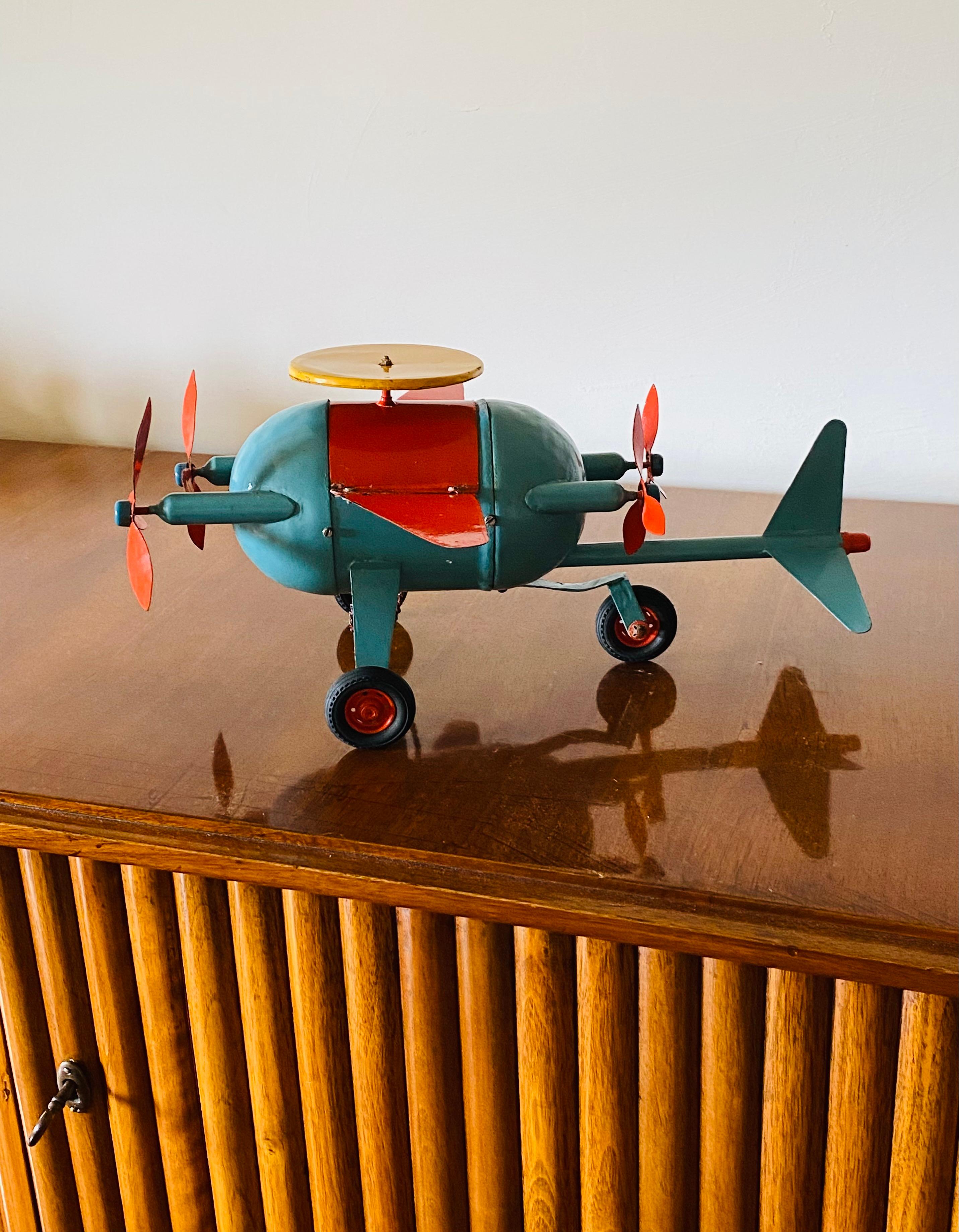Folk Art Red and blue airplane toy, France early 20th century For Sale