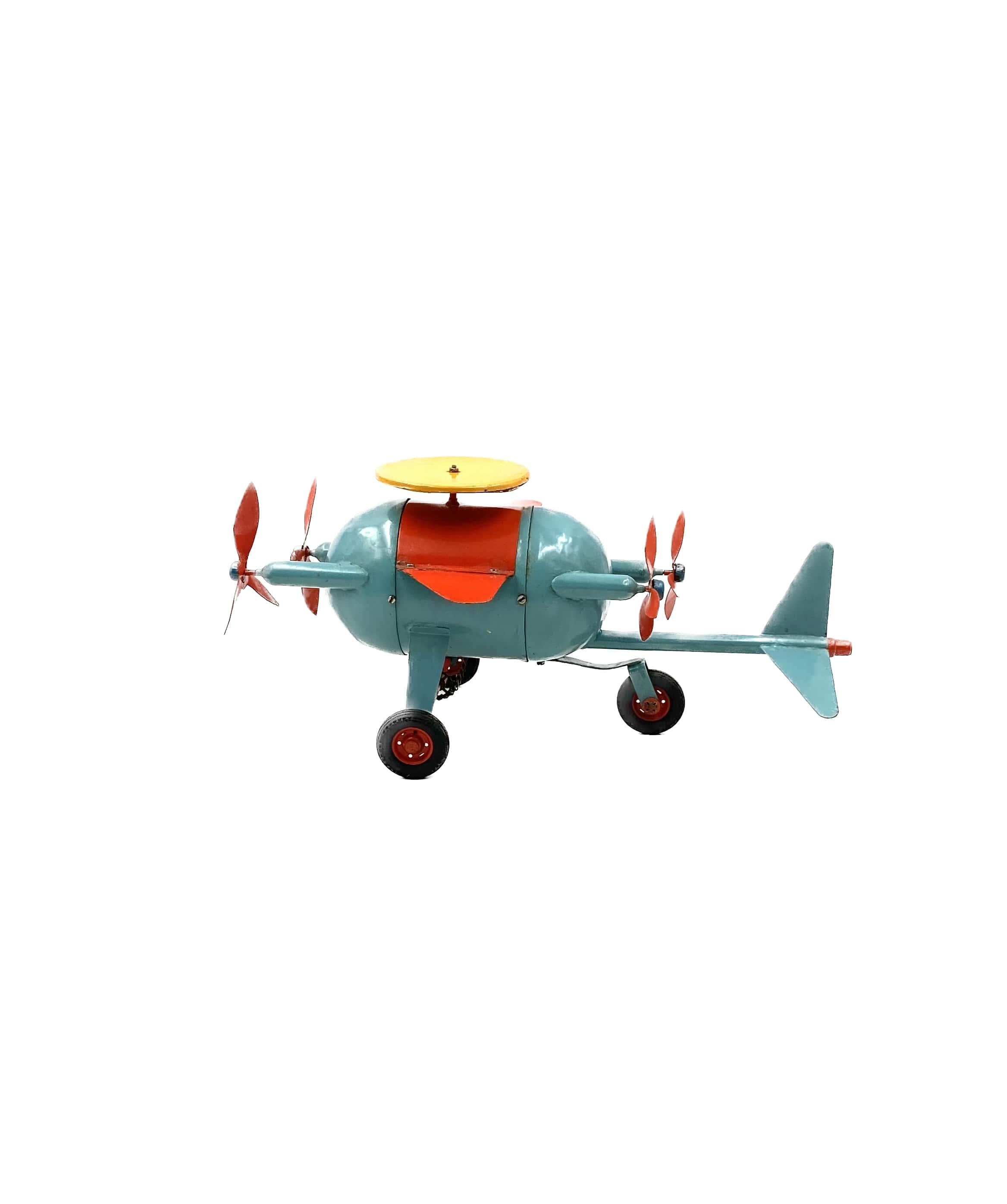 Rotes und blaues Flugzeugspielzeug, Frankreich Anfang 20 (Aluminium)
