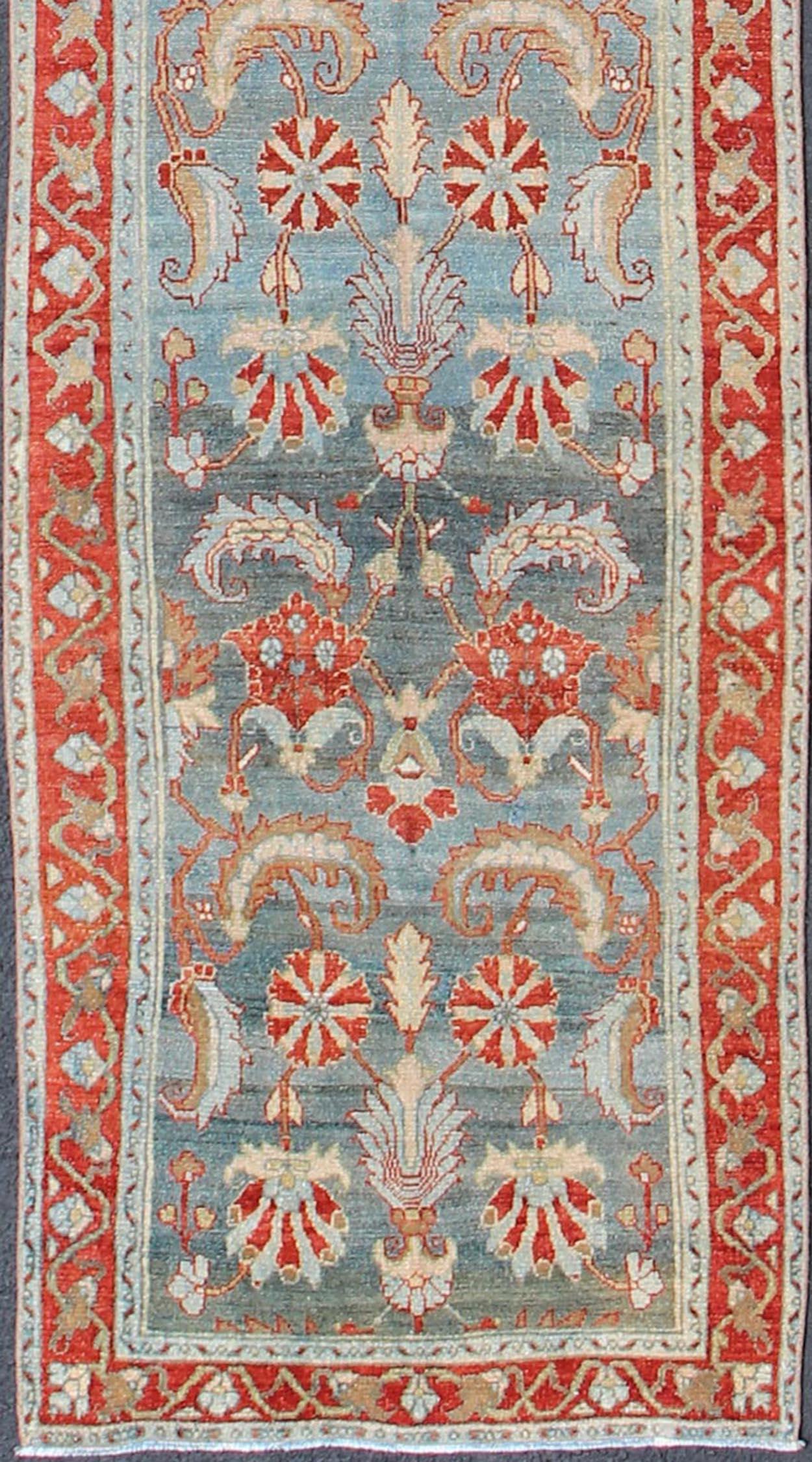 Hamedan Persian antique runner with blue and red geometric motifs, rug sus-1807-227, country of origin / type: Iran / Hamedan, circa 1920

This antique Persian Hamedan gallery rug (circa early 20th century) features a unique blend of colors and an