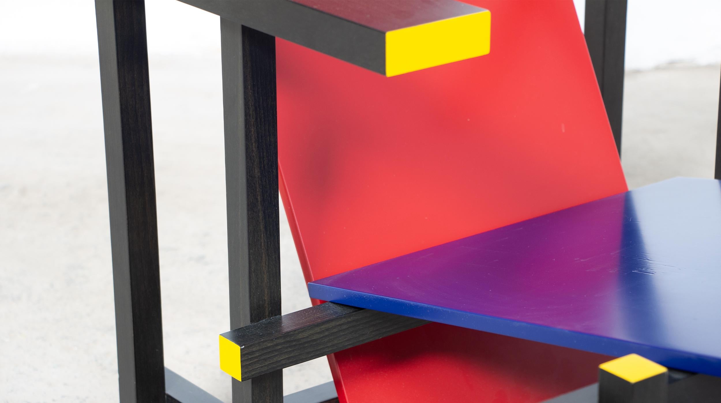 Lacquered Red and blue chair Gerrit Rietveld for Cassina For Sale