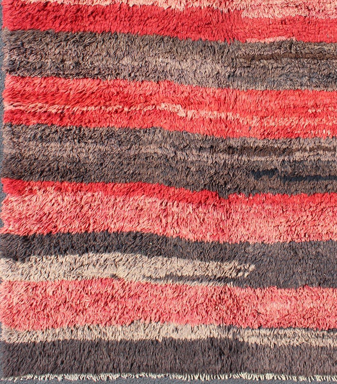 Tribal Vintage Tulu rug from Turkey in charcoal and red with stripe Minimalist Design For Sale