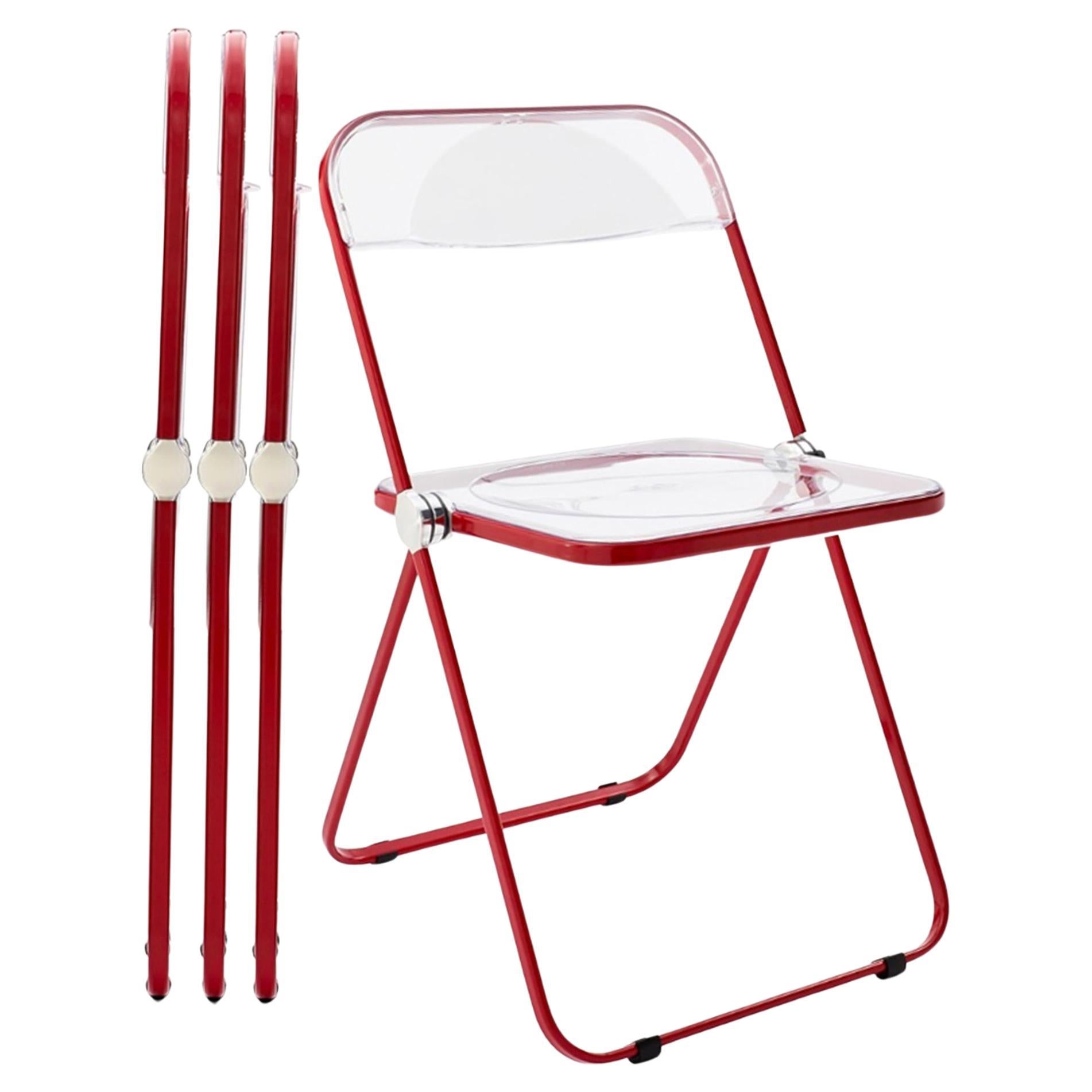 Red and Clear Lucite "Plia" folding chairs by Piretti for Castelli Italy
