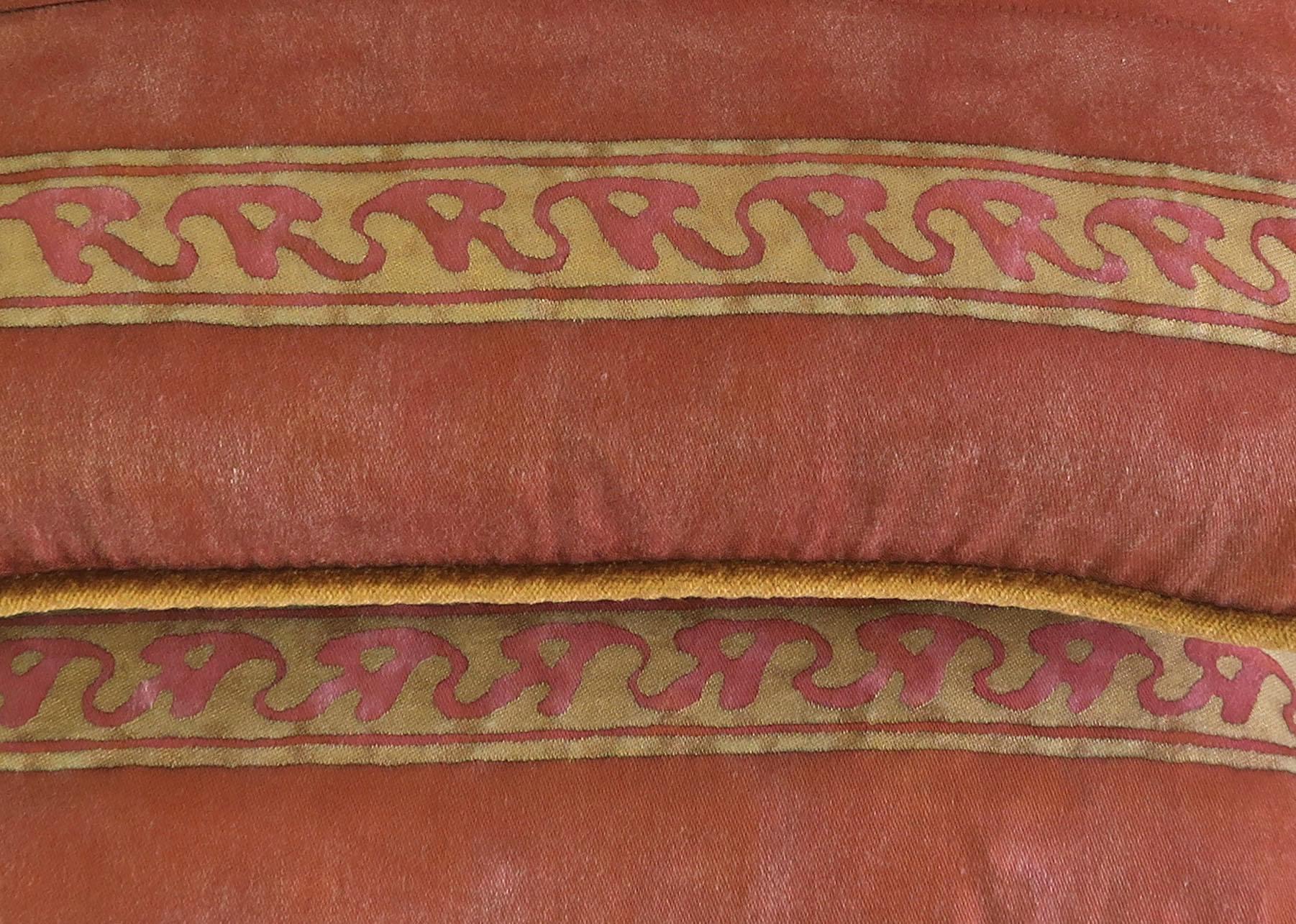 Pair of red and silvery gold Fortuny textile pillow fronts combined with gold velvet back. Down inserts, sewn shut.