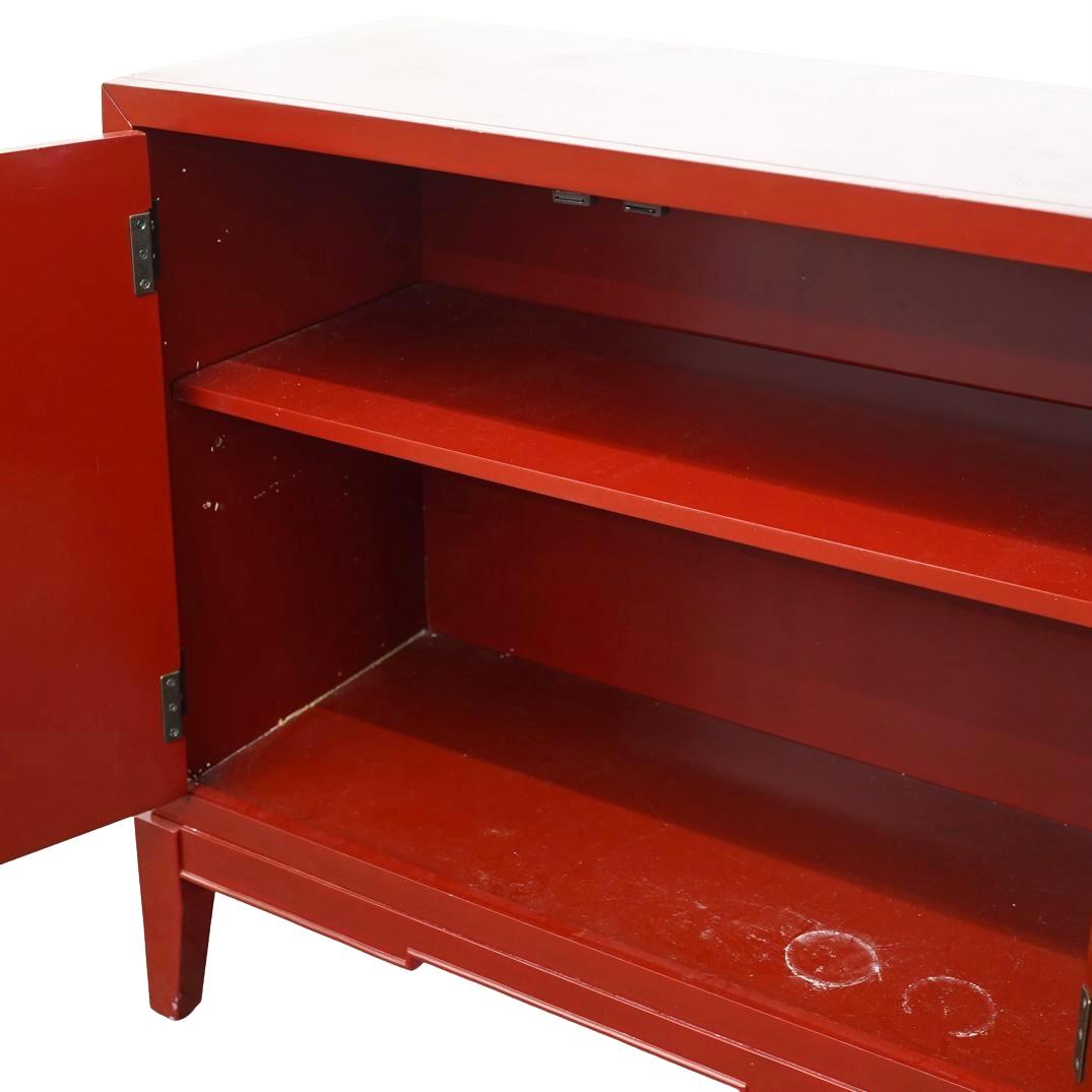 Lacquered Red and Gold Lacquer Carved Wood Cabinet For Sale