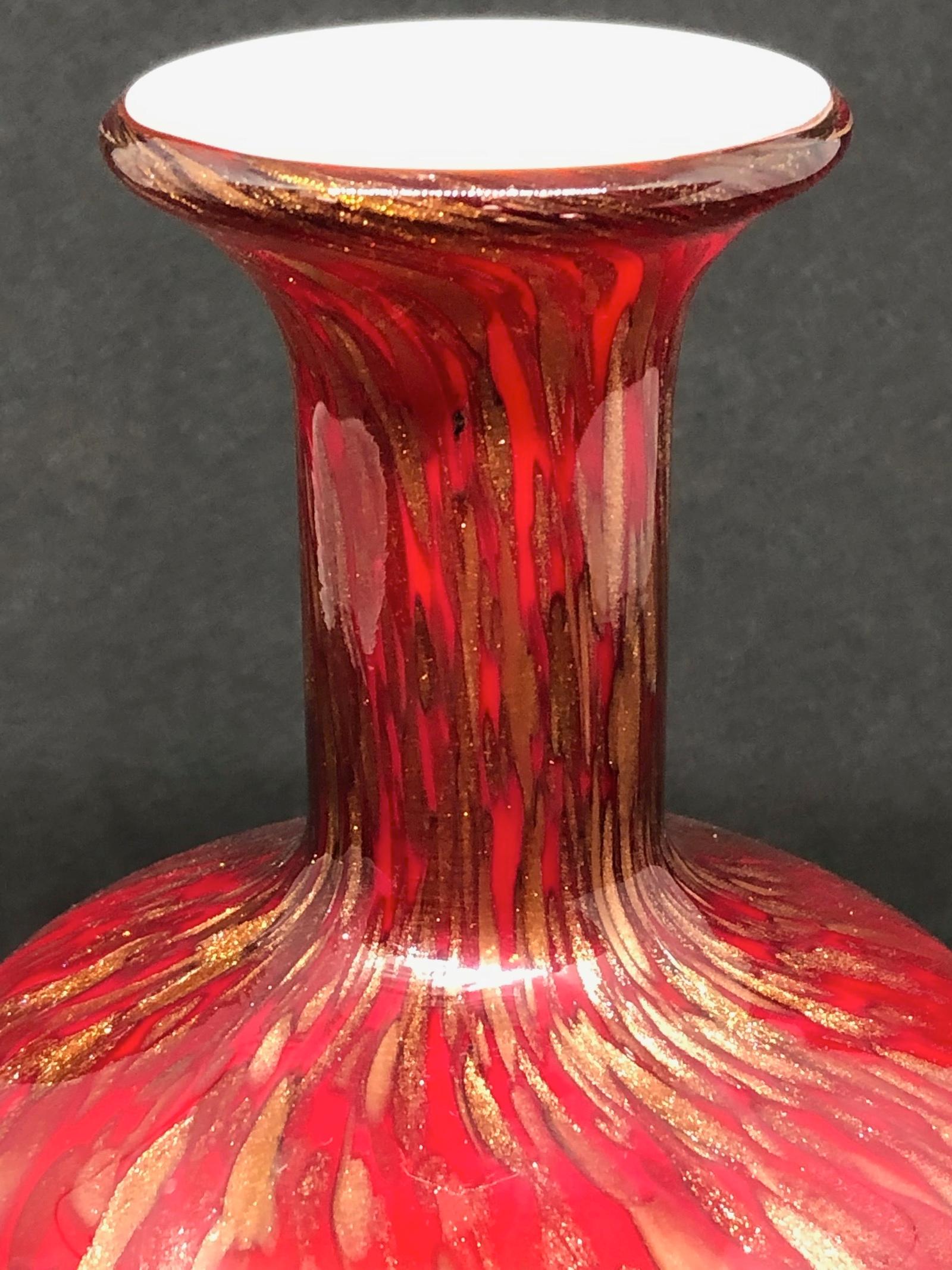 red and gold vases