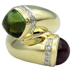 Bague bypass en or jaune 14 carats avec tourmaline cabochon rouge et verte et diamants