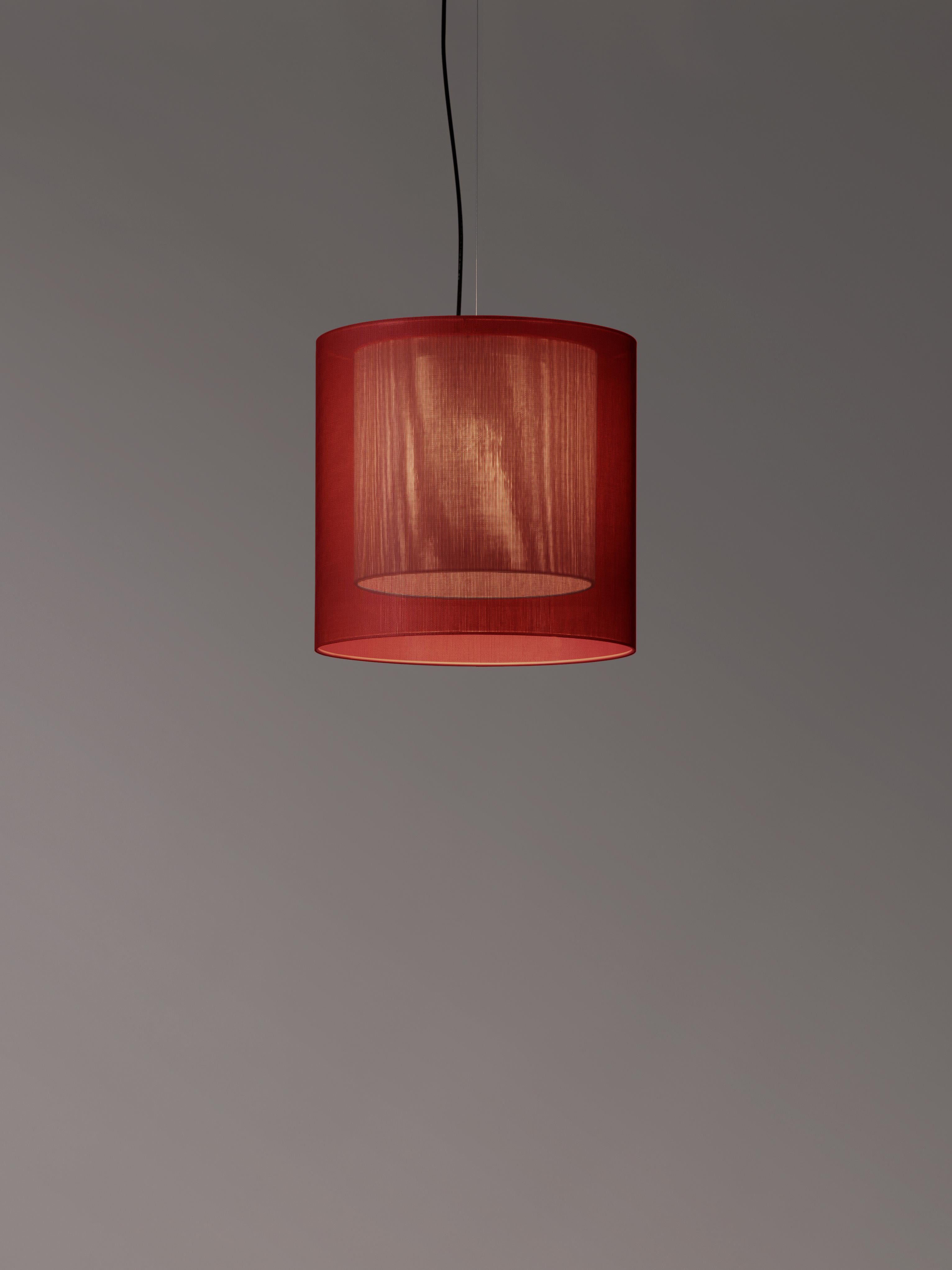 Red and grey Moaré MS pendant lamp by Antoni Arola
Dimensions: D 46 x H 45 cm
Materials: Metal, polyester.
Available in other colors and sizes.

Moaré’s multiple combinations of formats and colours make it highly versatile. The series takes its name