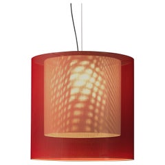 Lampe pendante Moaré XL rouge et blanche d'Antoni Arola