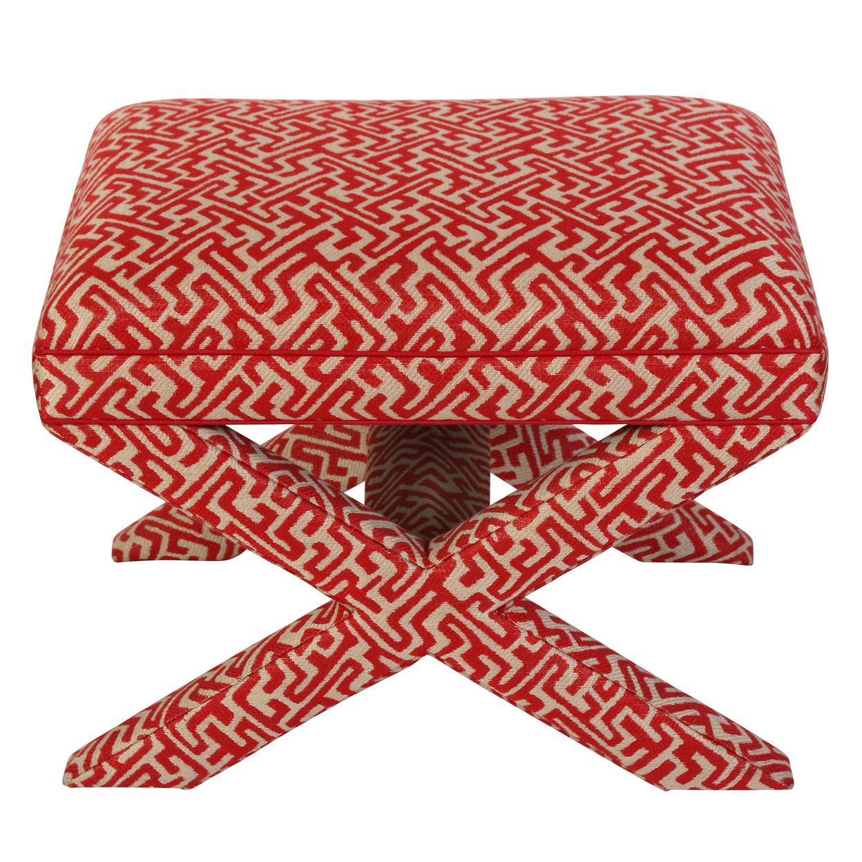 A small ottoman with x-form legs covered in a bright red and white fabric with a Greek key design.  Perfect as a foot stool or a spot to perch books, this little gem will brighten up any room!