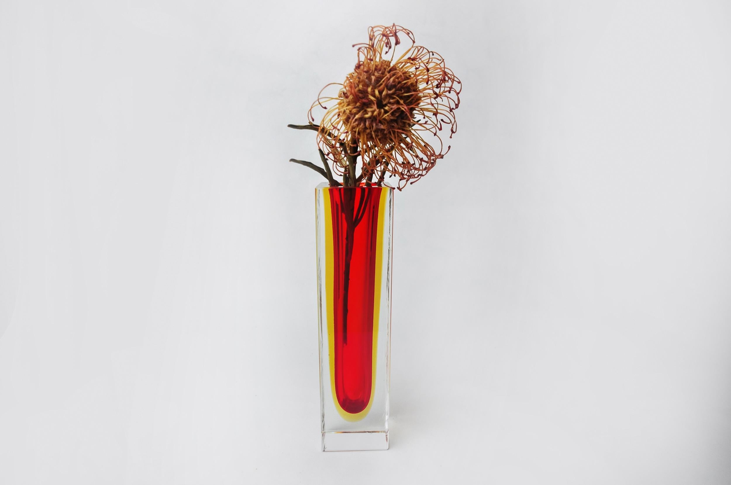 Superb and rare red and yellow cubic sommerso vase designed and manufactured for Seguso in Murano in the 1970s. Handcrafted work of faceted glass using the 