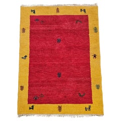 Alfombra Gabbeh anudada a mano, roja y amarilla, 100% lana Irán años 70