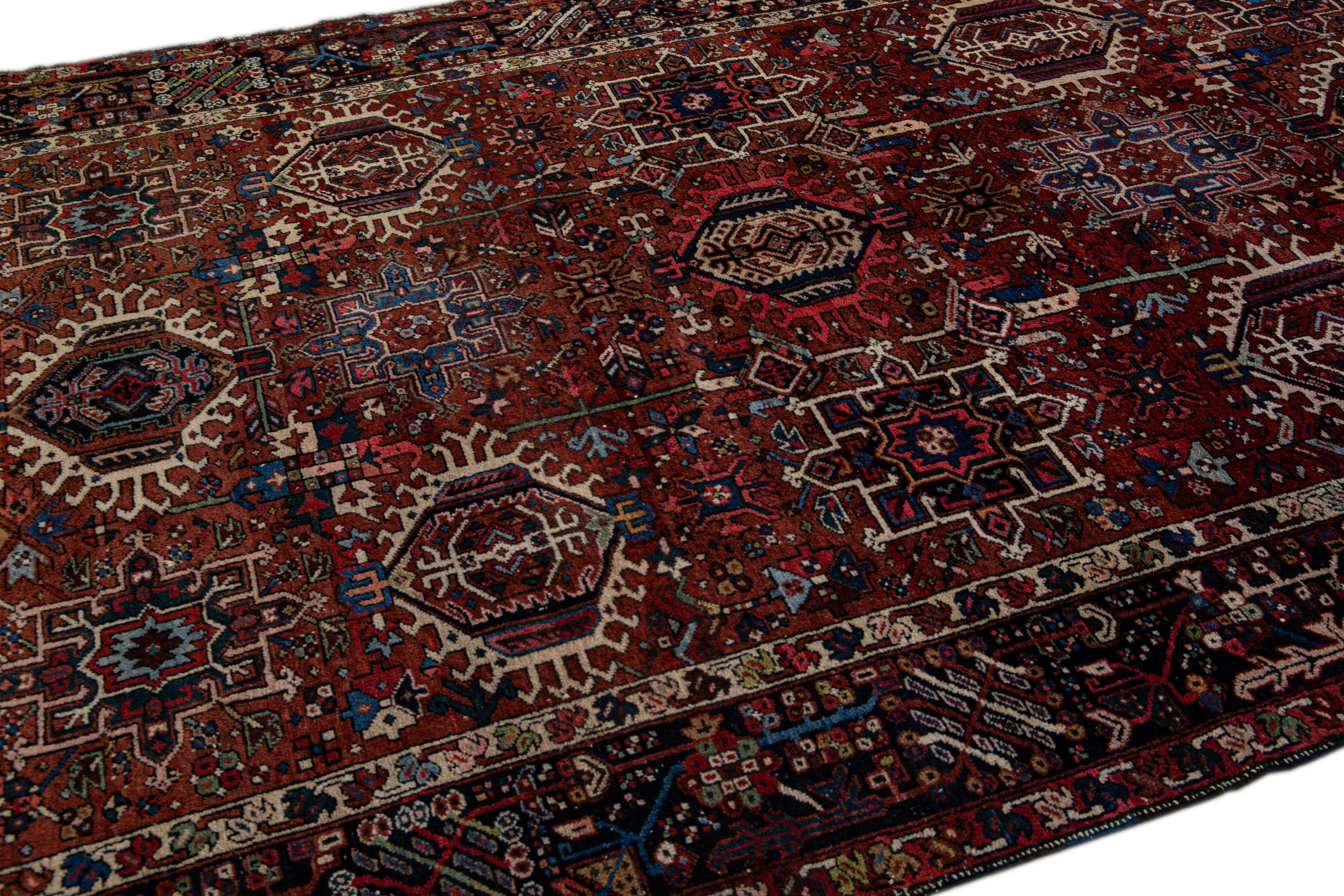 Hand-Knotted Red Antique Heriz Handmade Medallion Wool Rug For Sale