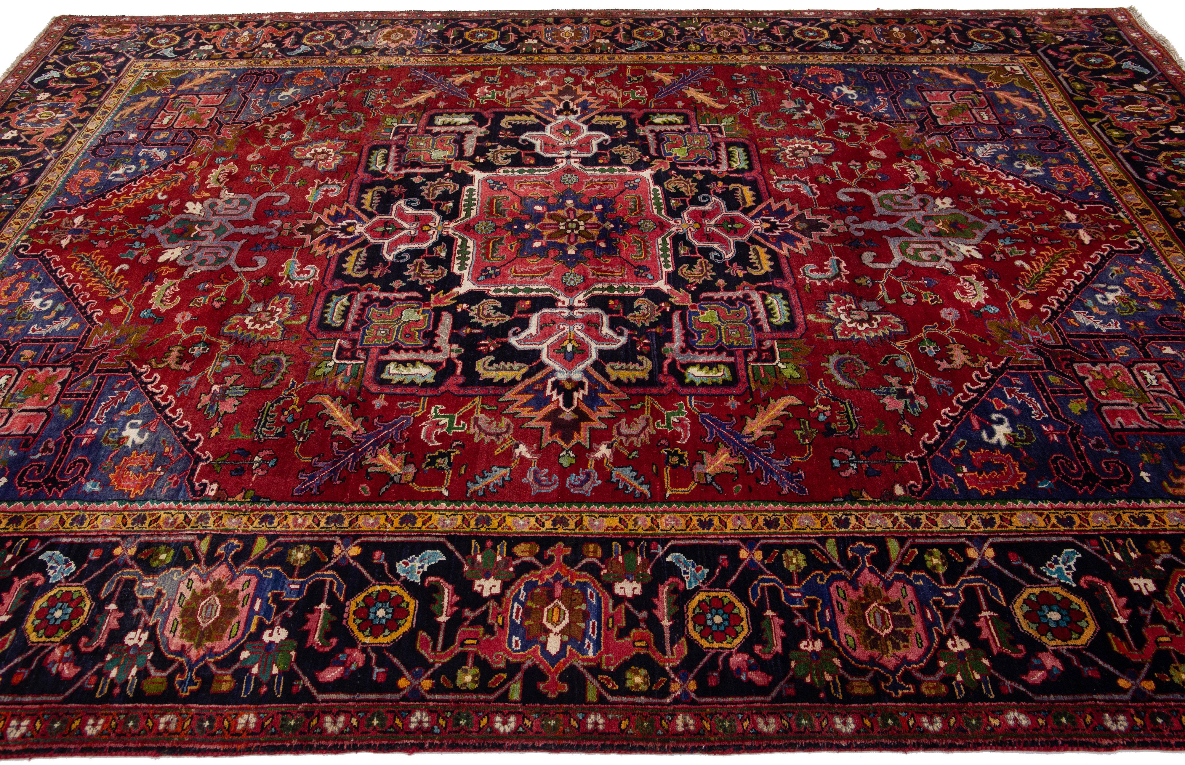 Red Antique Heriz Handmade Persian Wool Rug with Allover Multicolor Motif In Distressed Condition For Sale In Norwalk, CT