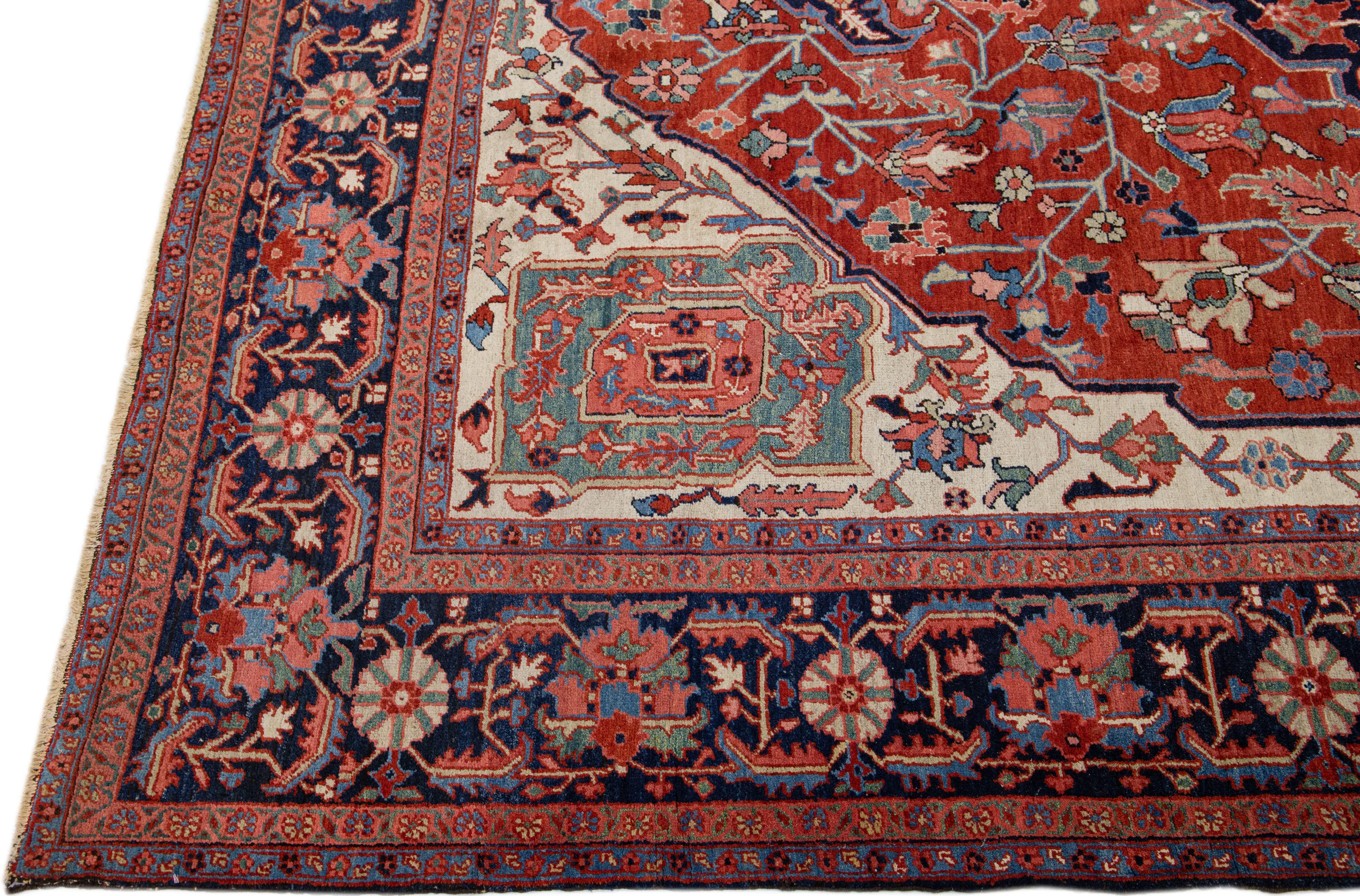 Hand-Knotted Red Antique Heriz Handmade Room Size Persian Wool Rug with Medallion Motif For Sale