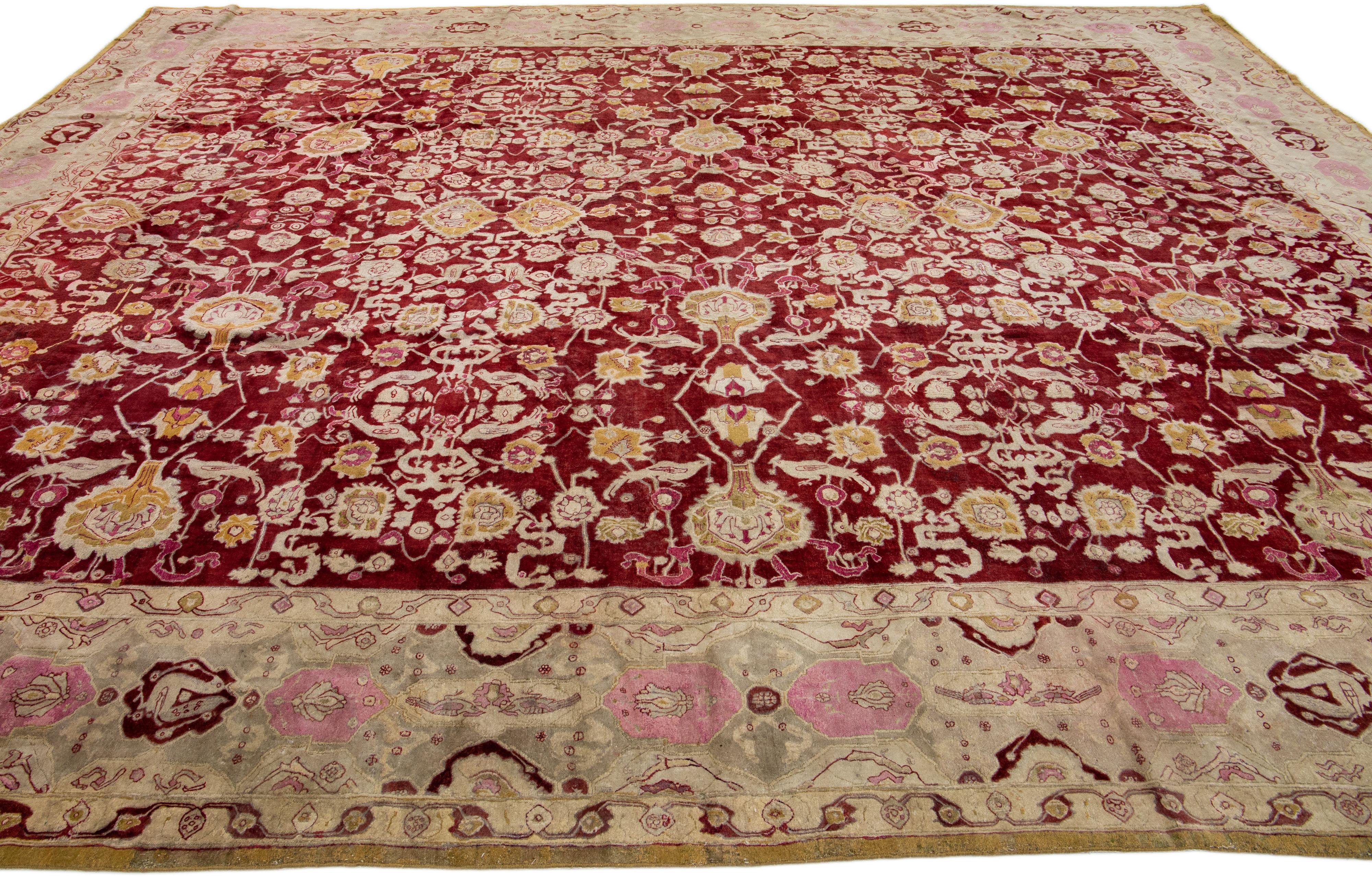 20th Century Red Antique Indian Agra Handmade Allover Motif Wool Rug For Sale