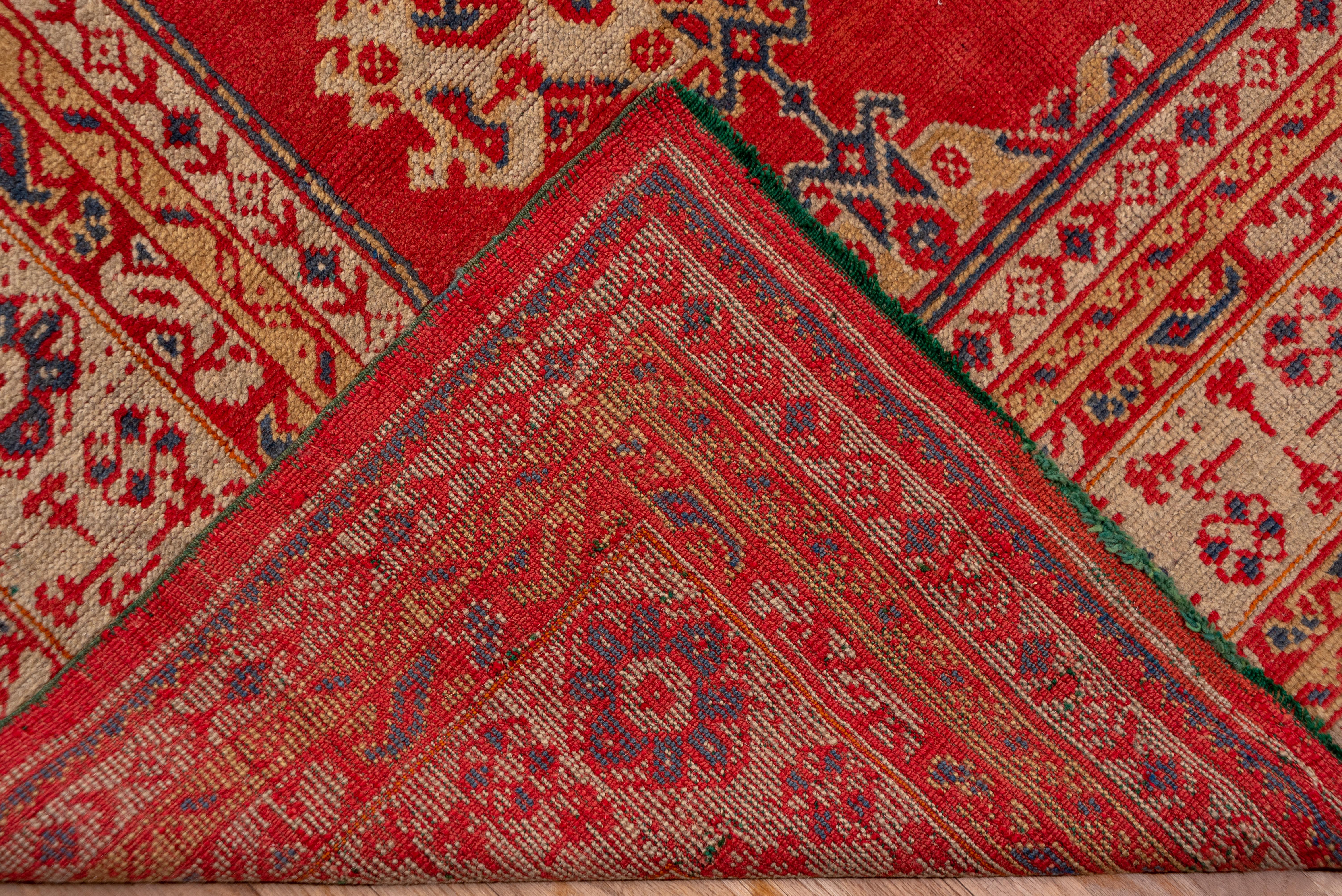 20th Century Red Antique Oushak Carpet, circa 1920s For Sale