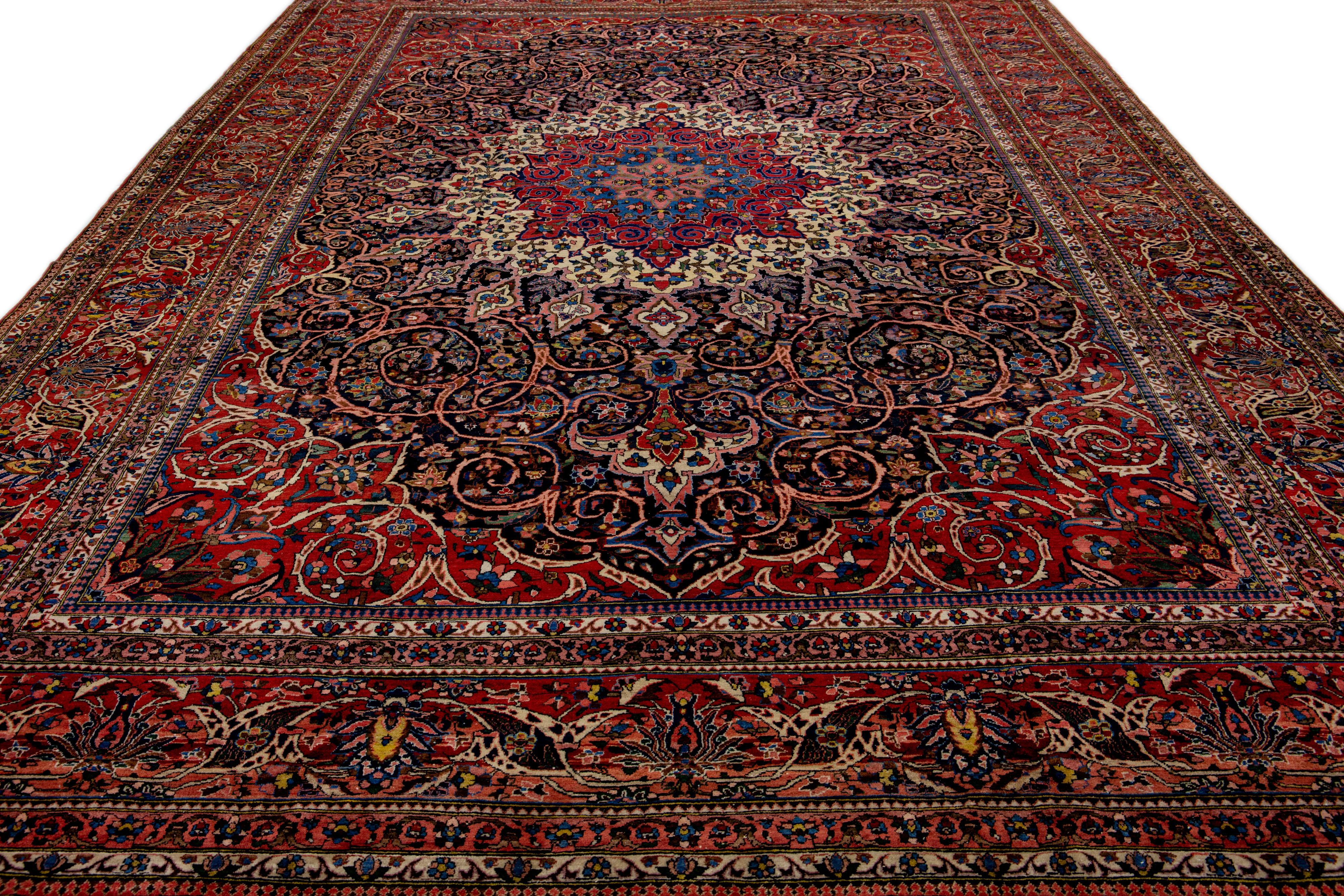 Islamic Red Antique Persian Bakhtiari Handmade Oversize Wool Rug with Rosette Pattern For Sale