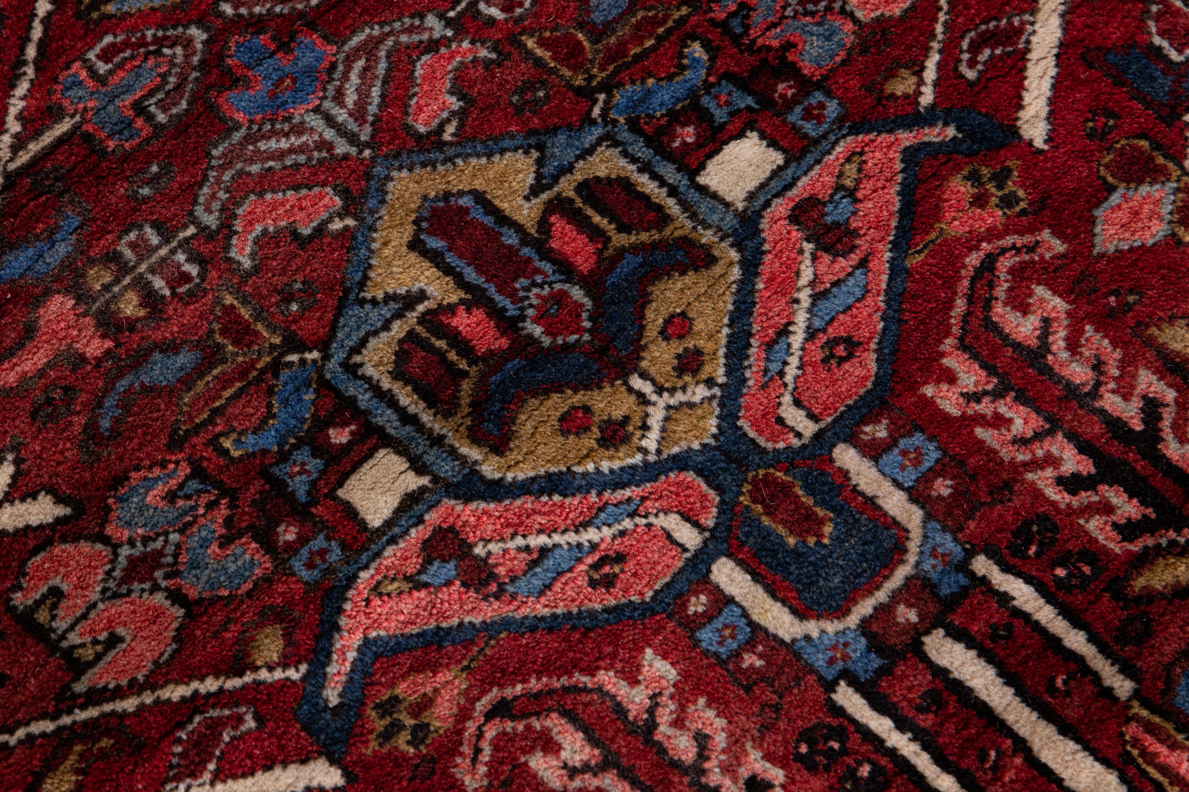20th Century Red Antique Persian Heriz Handmade Allover Designed Wool Rug For Sale