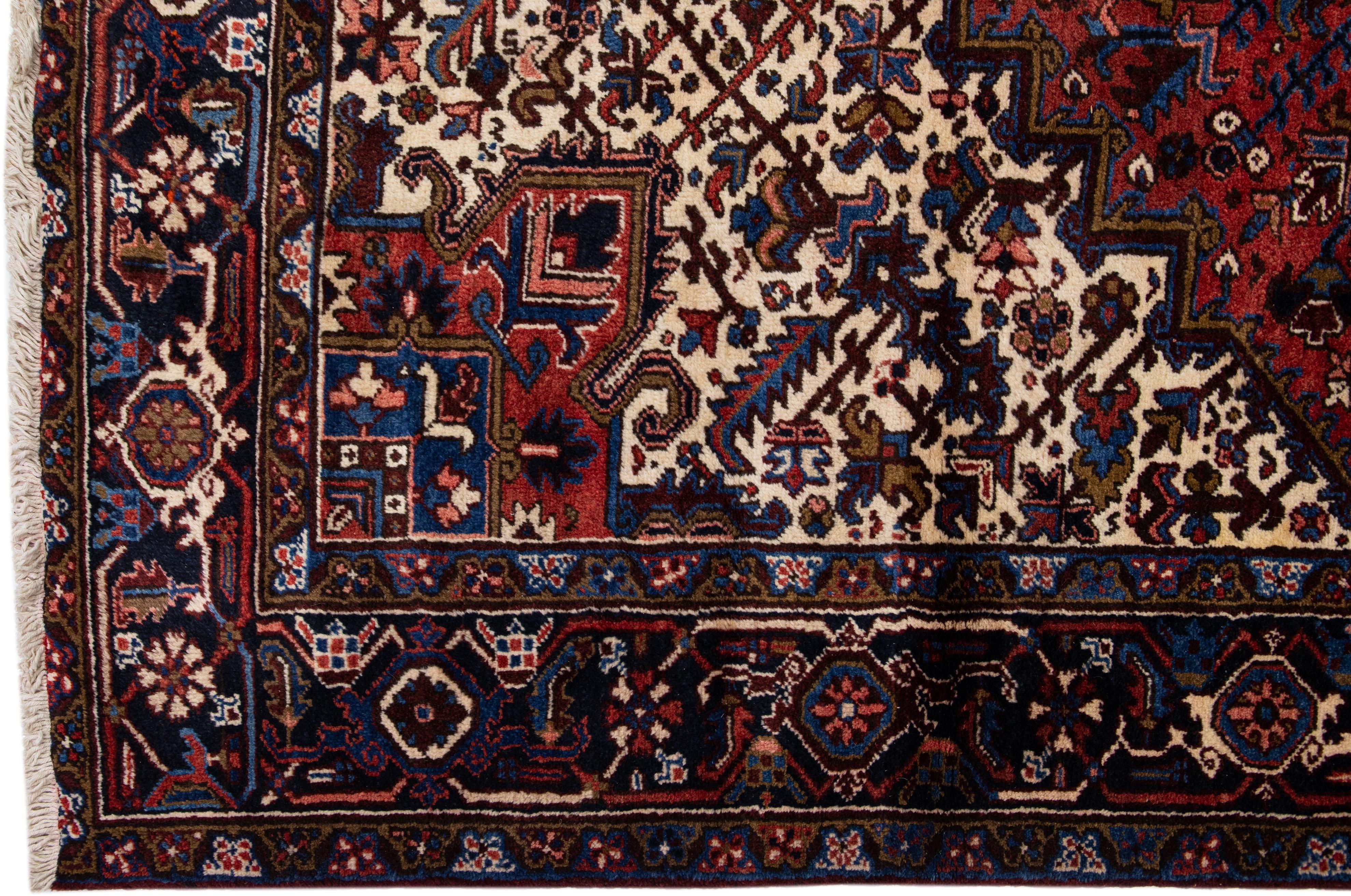 Heriz Serapi Red Antique Persian Heriz Handmade Gallery Wool Rug with Medallion Motif For Sale