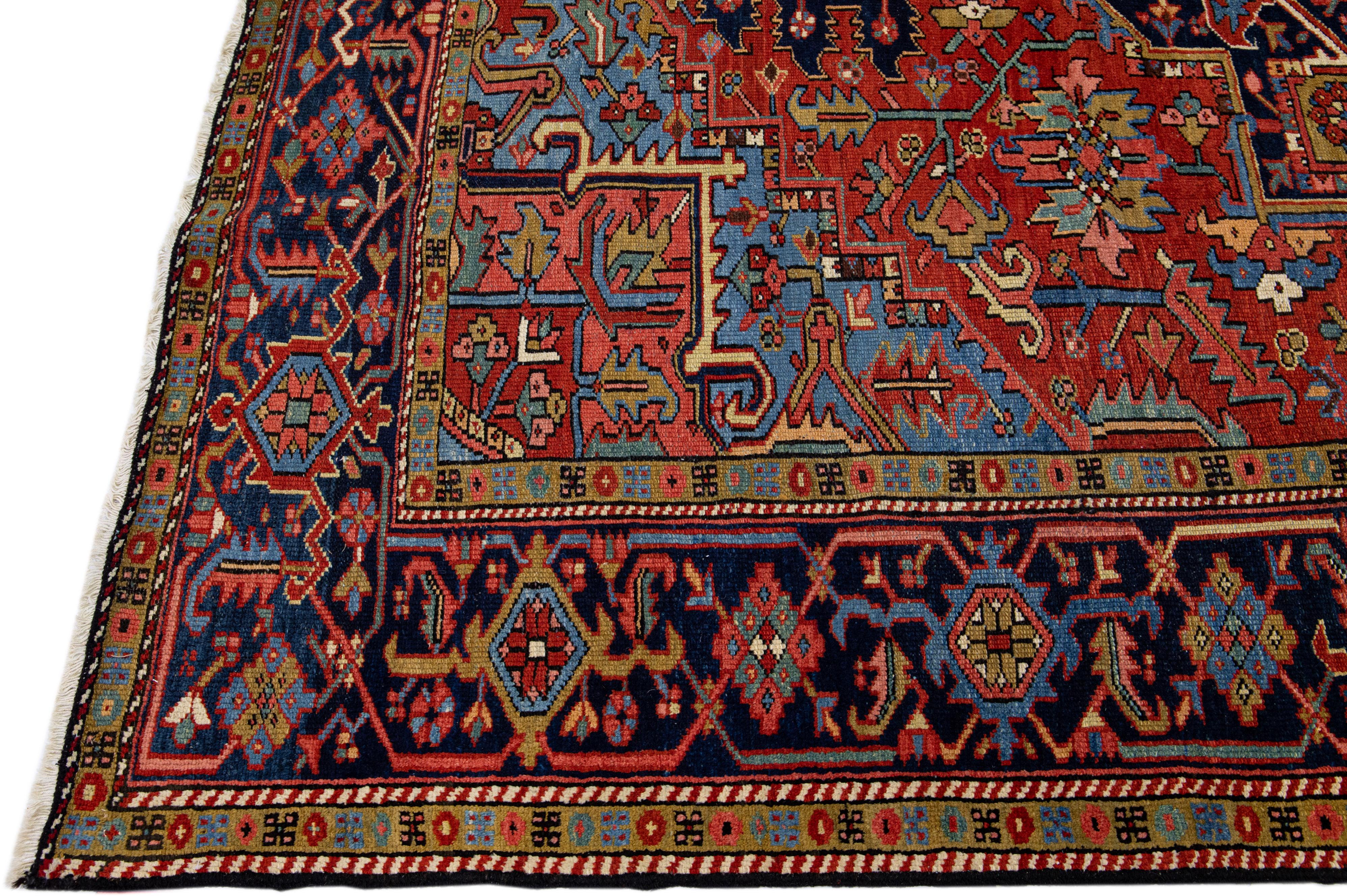 Hand-Knotted Red Antique Persian Heriz Handmade Wool Rug with Medallion Design For Sale