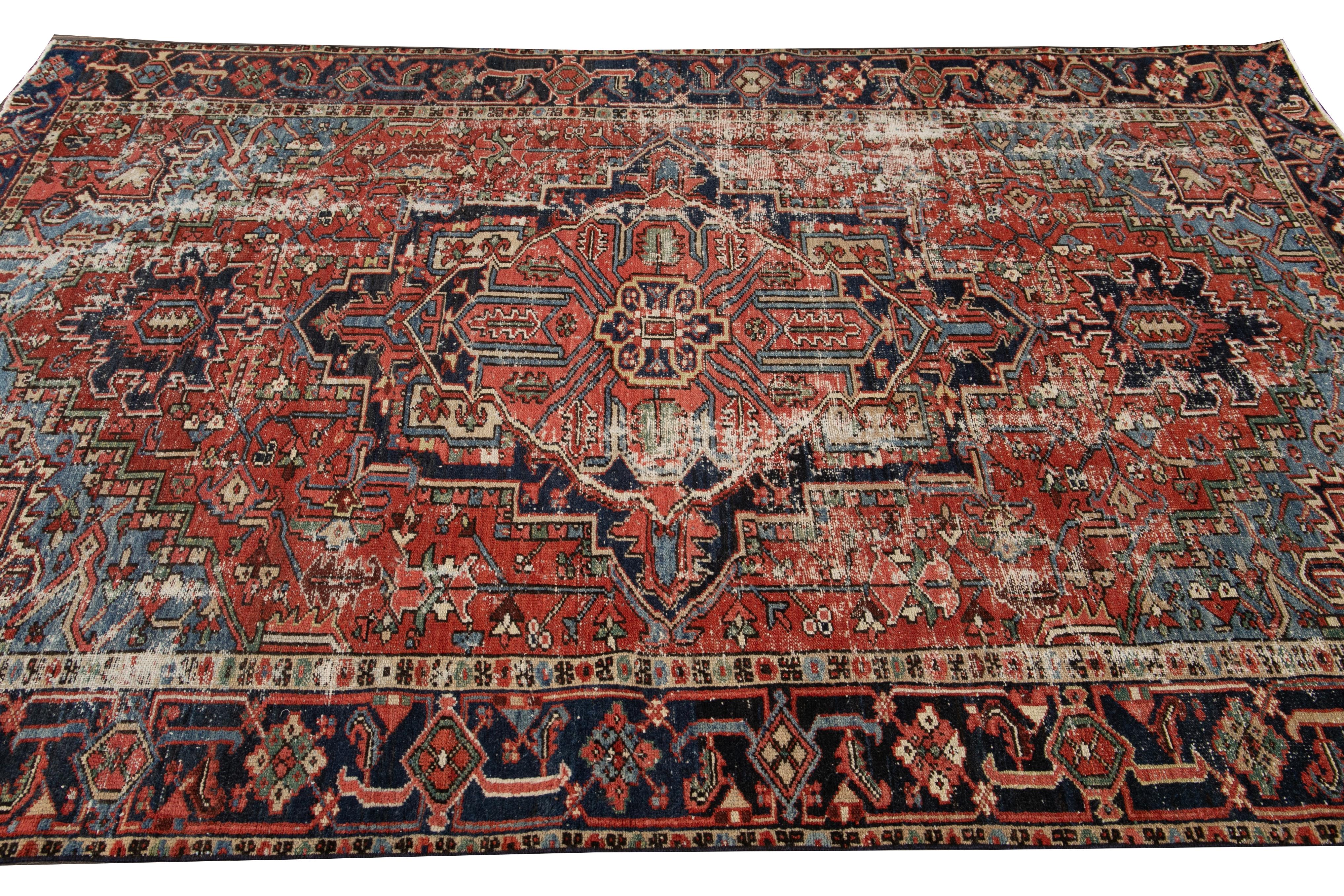 20th Century  Red Antique Persian Heriz Handmade Wool Rug with Medallion Design For Sale