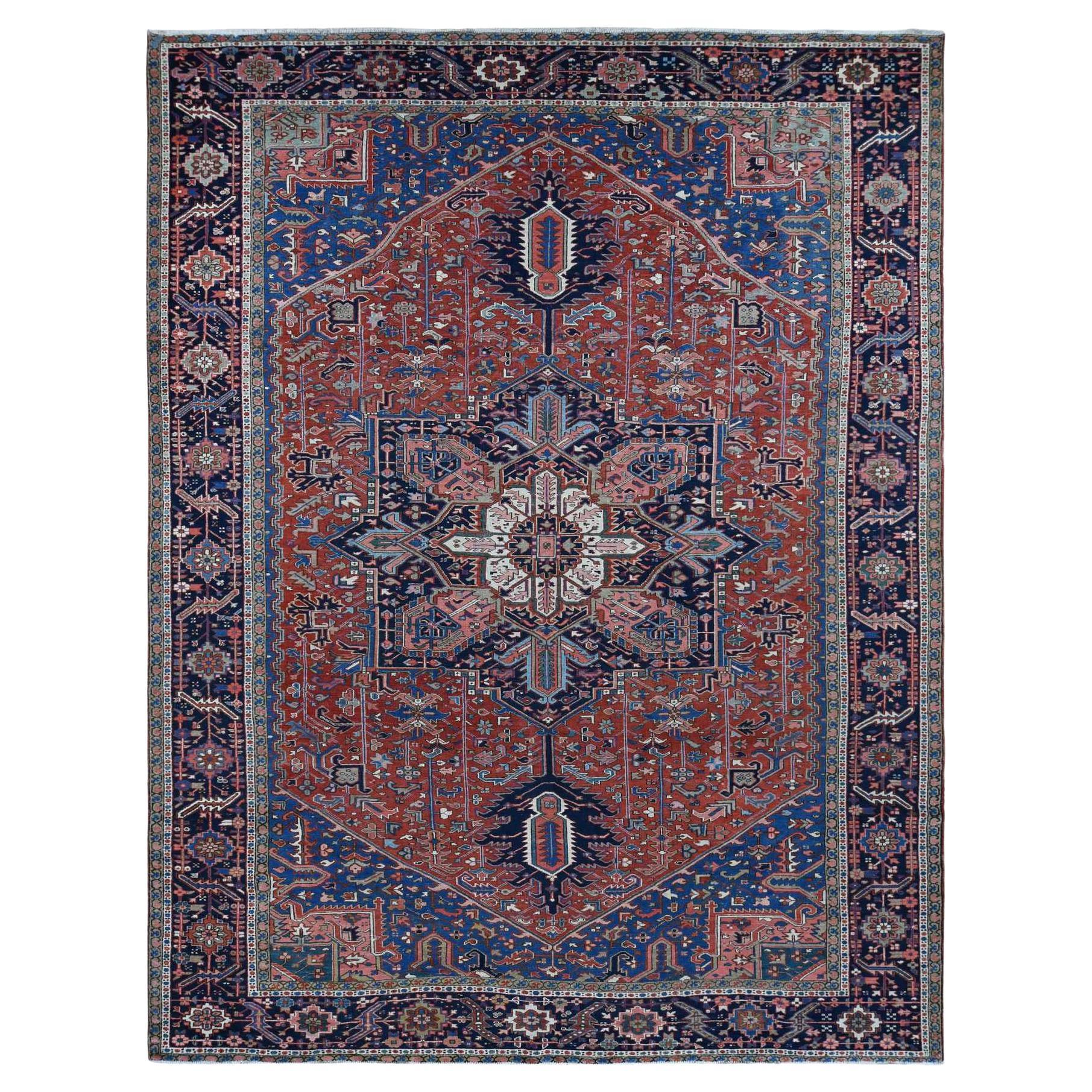 Tapis persan ancien rouge Heriz en pure laine nouée à la main, surdimensionné et surdimensionné