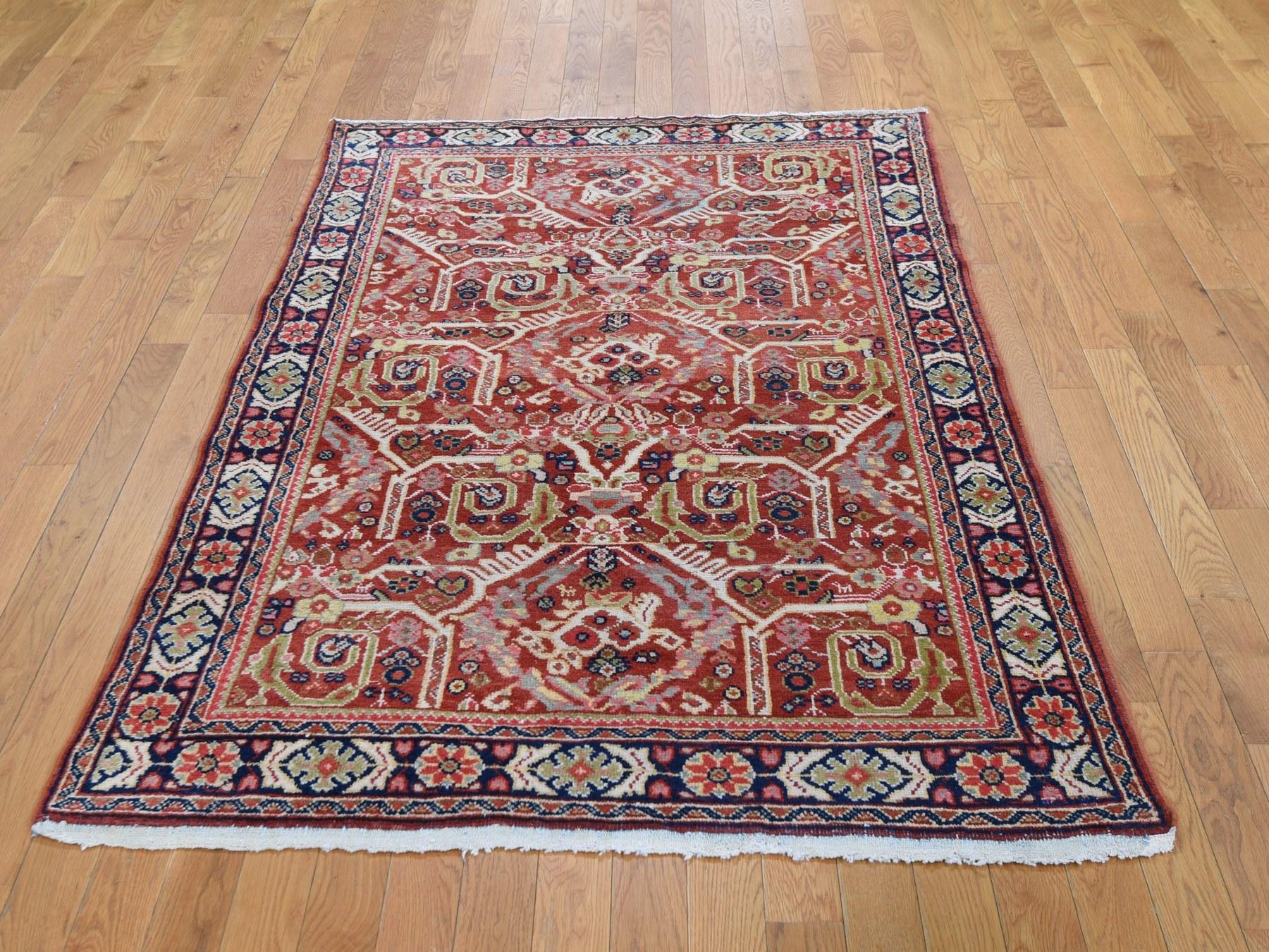This is a truly genuine one-of-a-kind red antique Persian Mahal excellent condition hand knotted oriental rug. It has been knotted for months and months in the centuries-old Persian weaving craftsmanship techniques by expert artisans. 

Primary