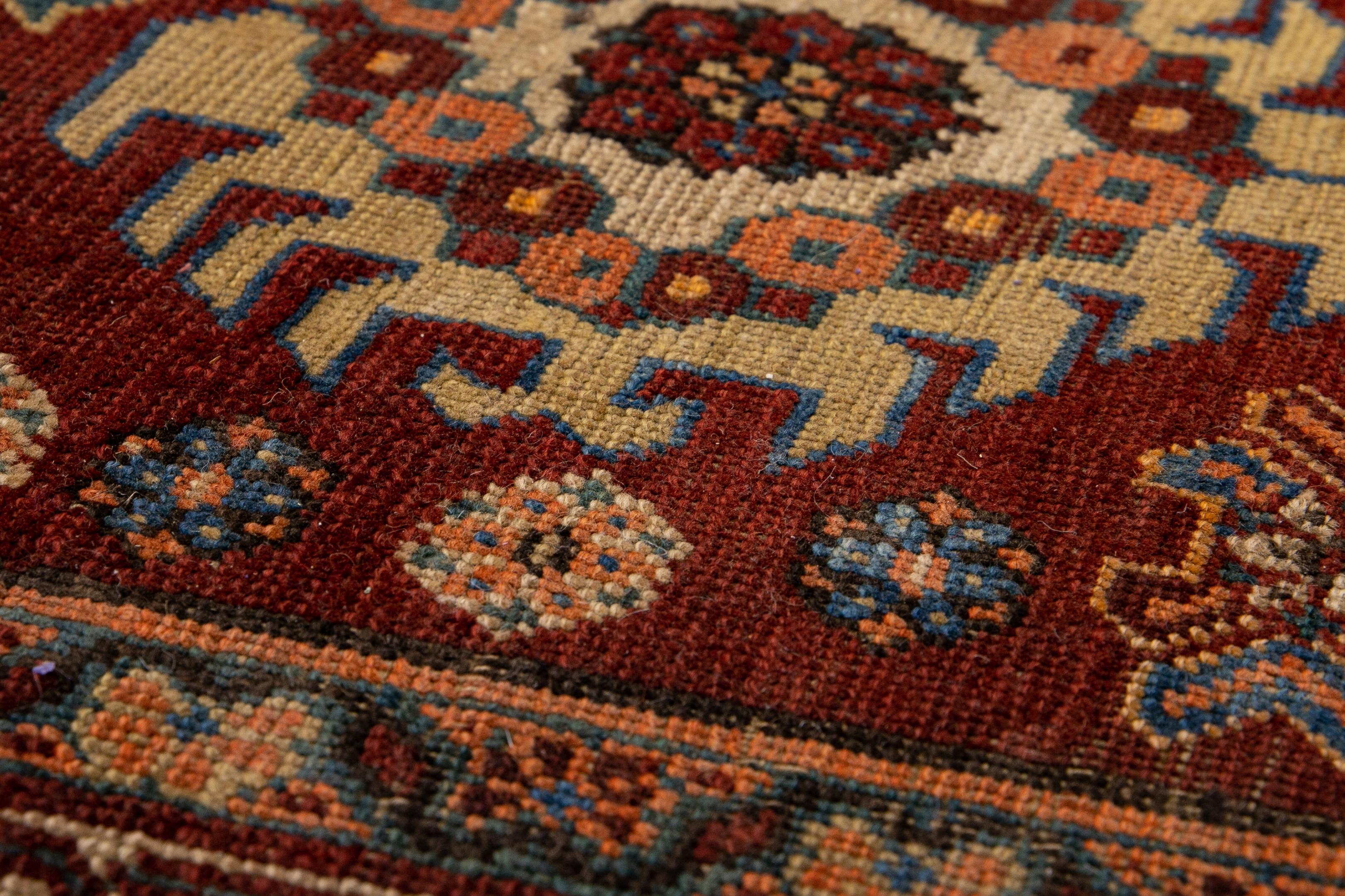 Early 20th Century Red Antique Serapi Persian Handmade Multi Medallion Motif Wool Runner For Sale